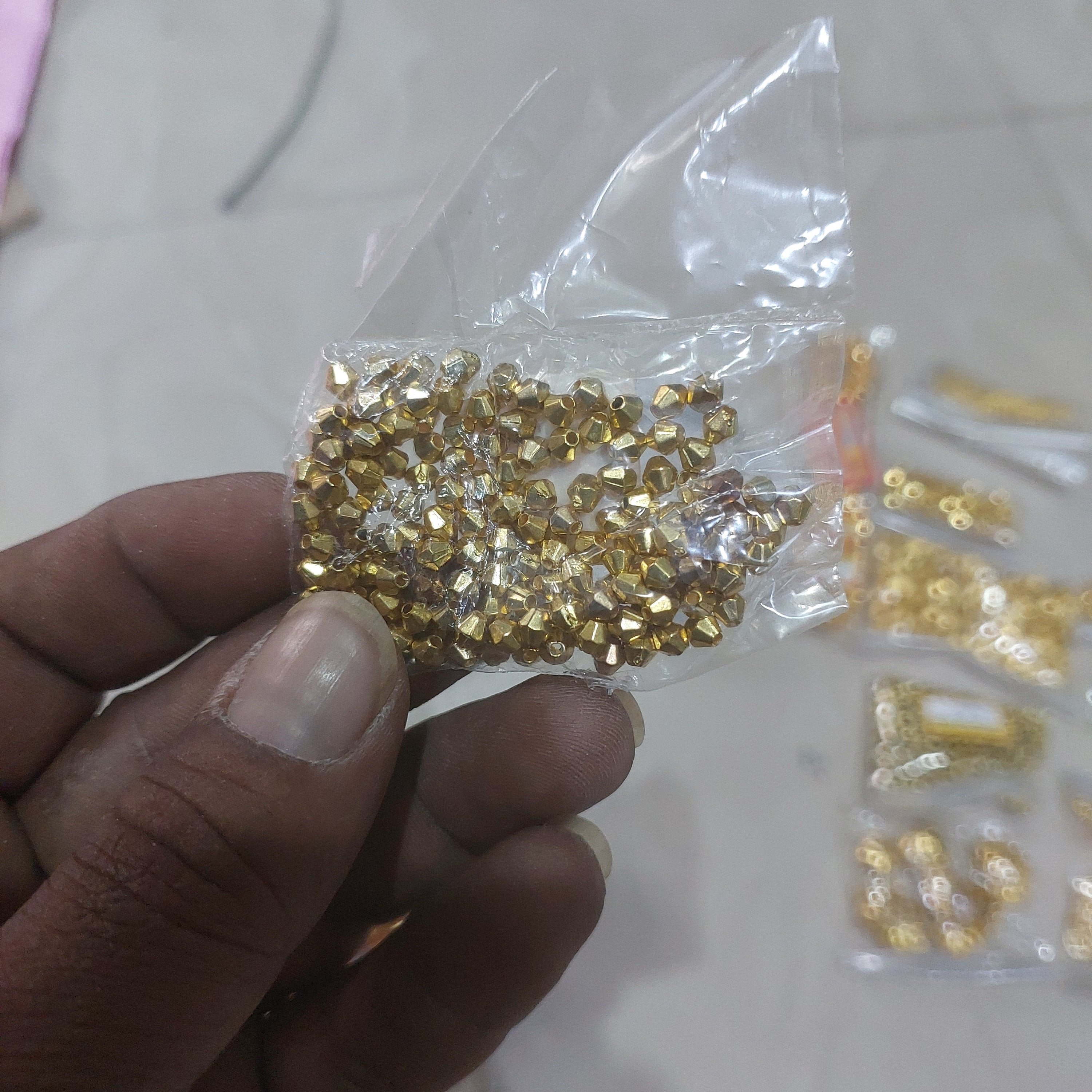 Gold drum spacer 4mm-90 piece in a pack approximately