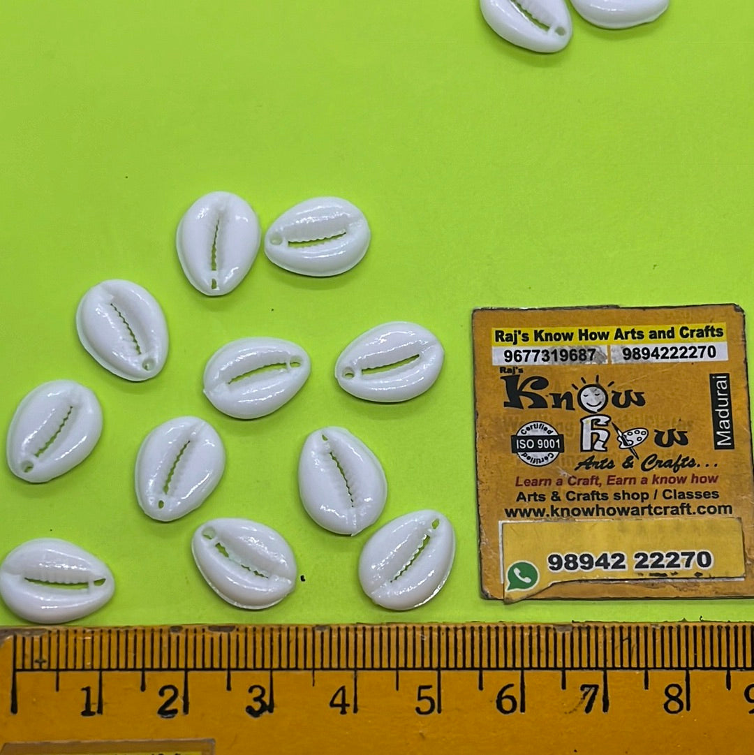 White plastic kauri sea shells 10pair in a pack