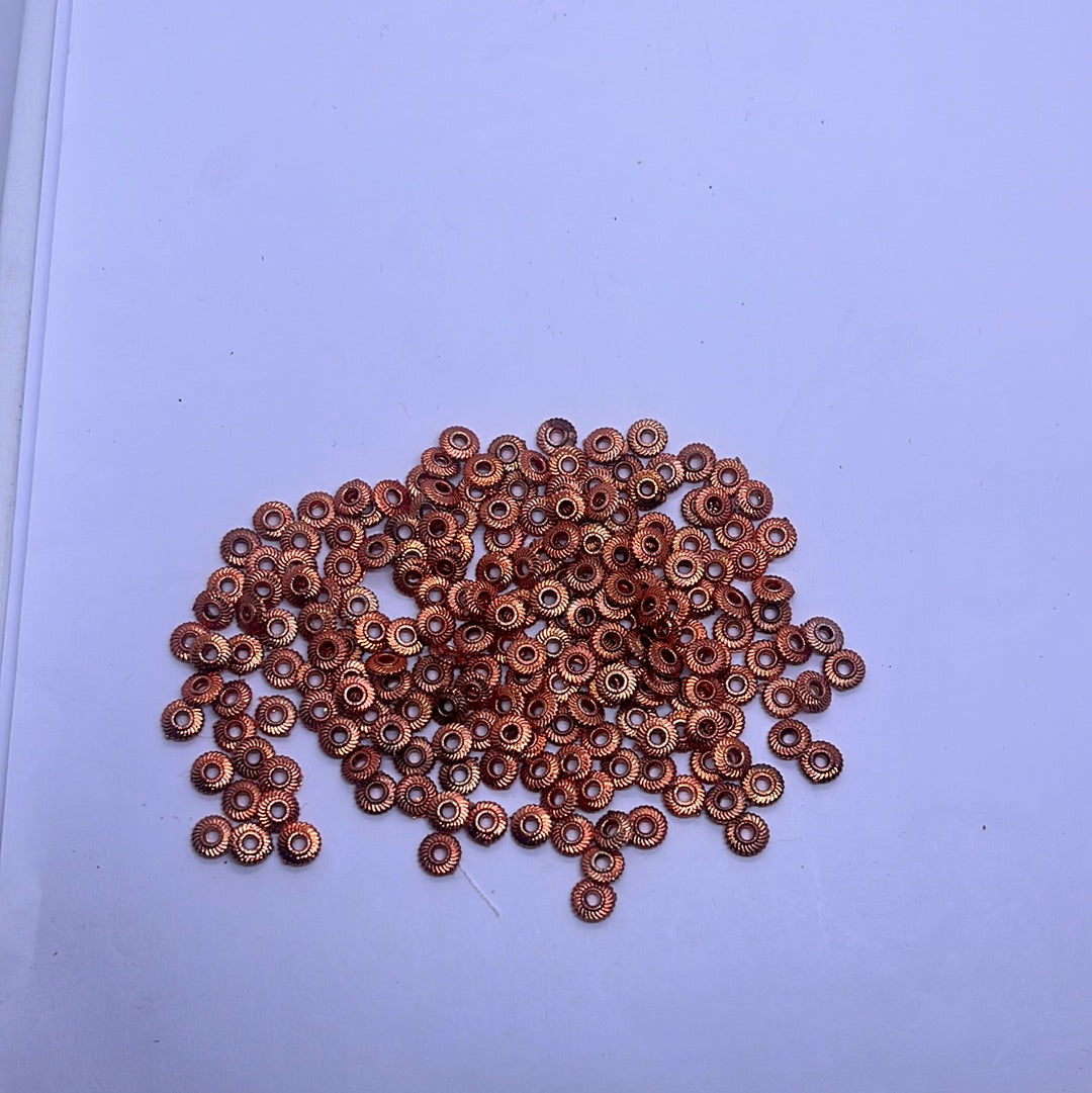 Bye rope Bali spacer  copper plated beads