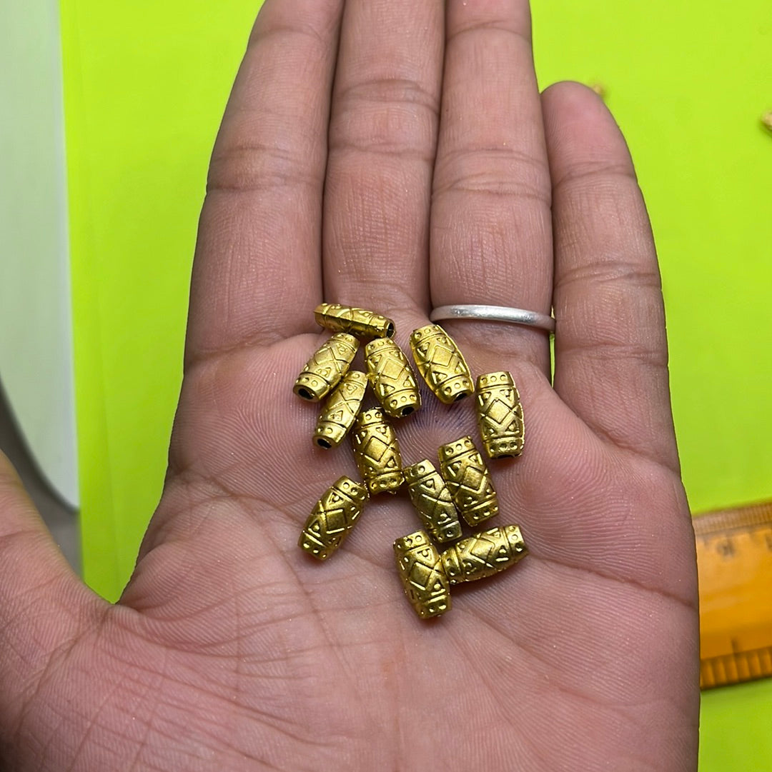 Golden colored plastic beads more than 25pc