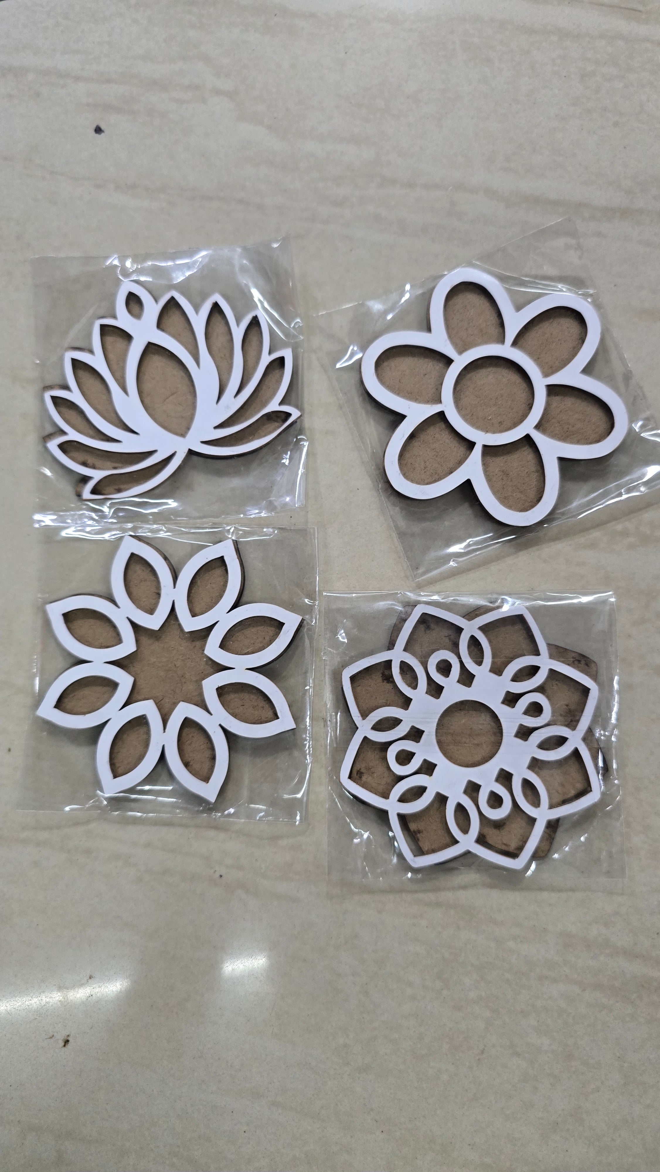 Mdf rangoli cutout 4piece assorted design set