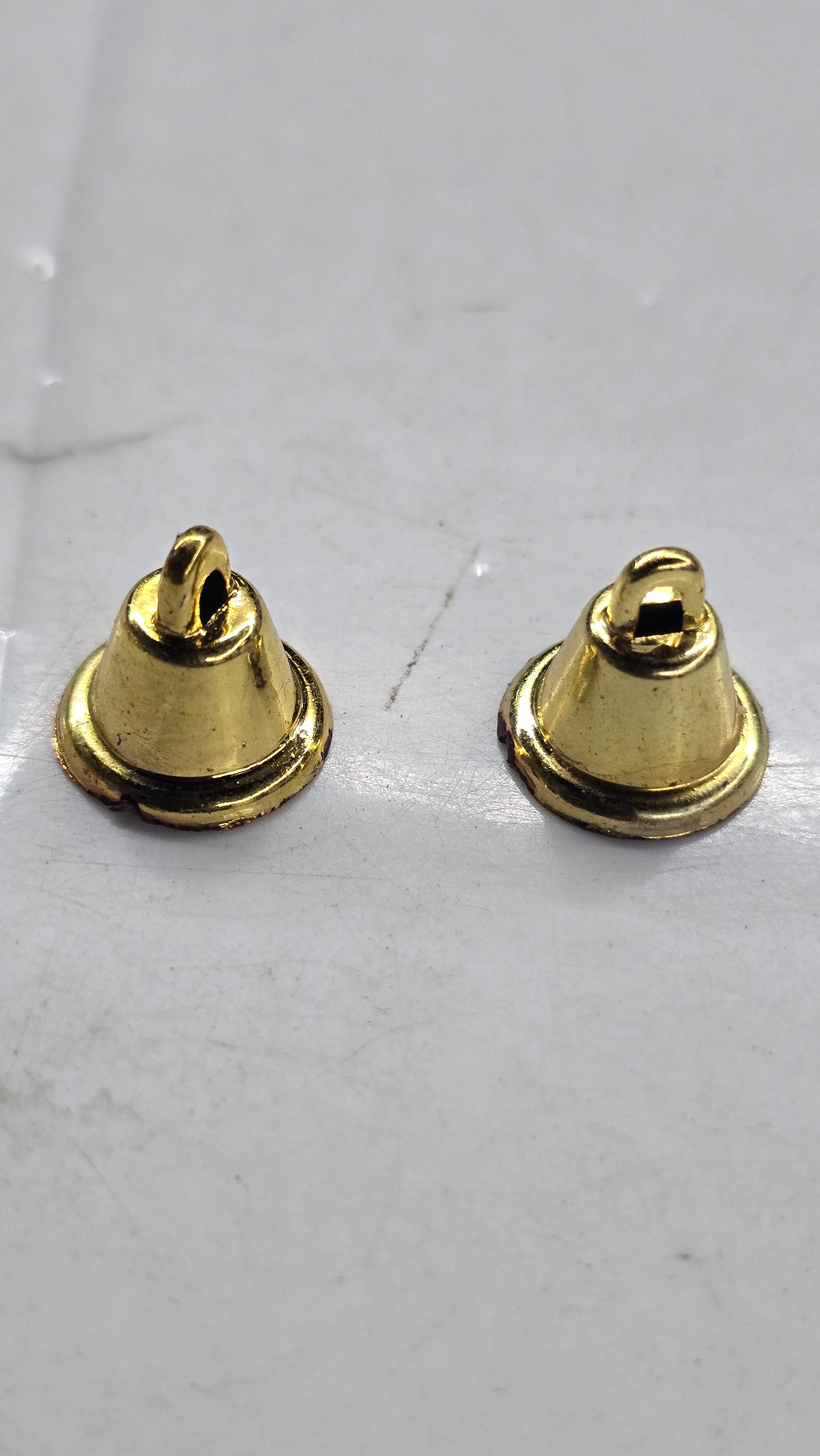 Plastic golden bells small size 50g pack- sbel