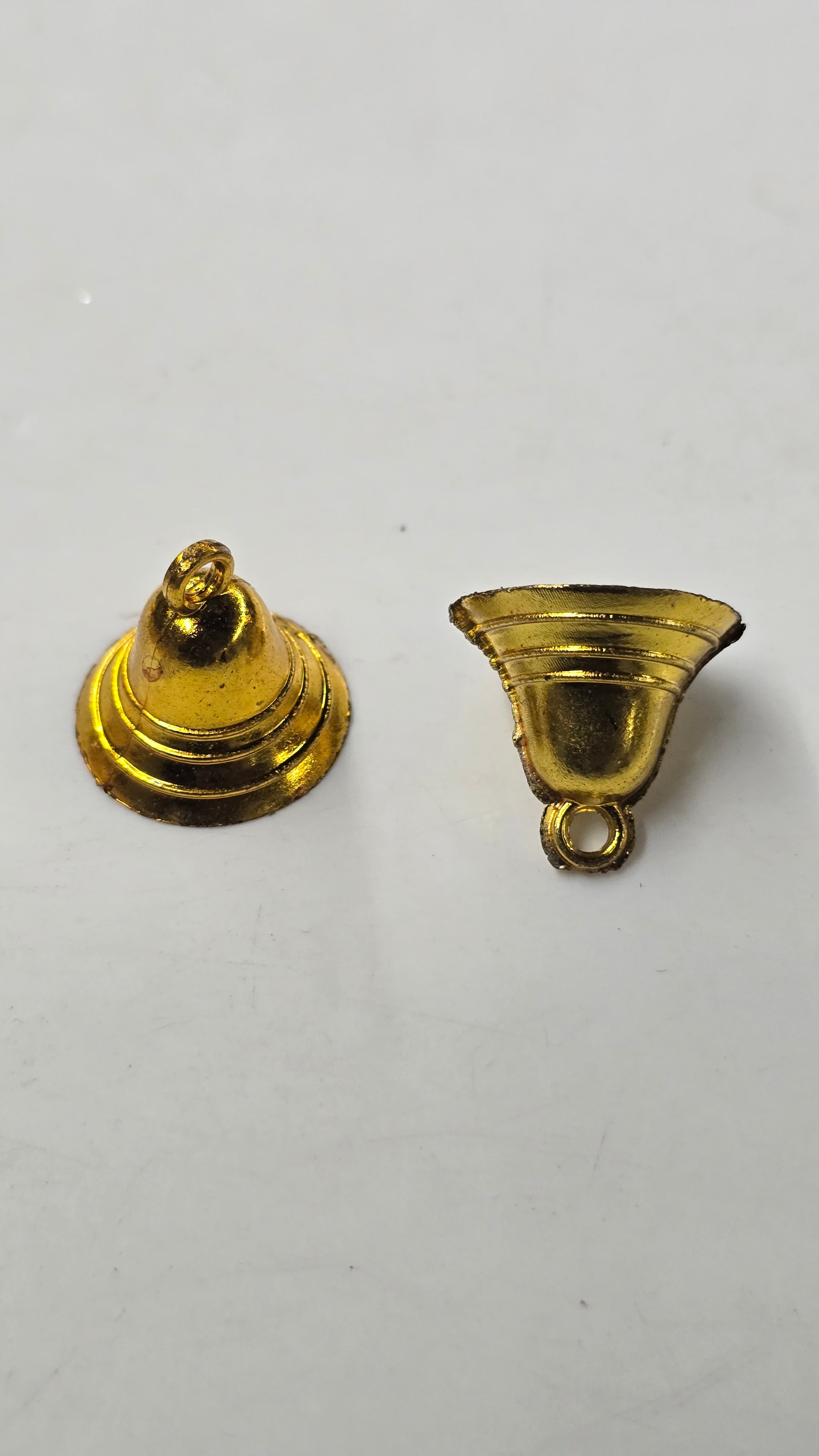 Plastic golden bells medium size 50g pack- sbel