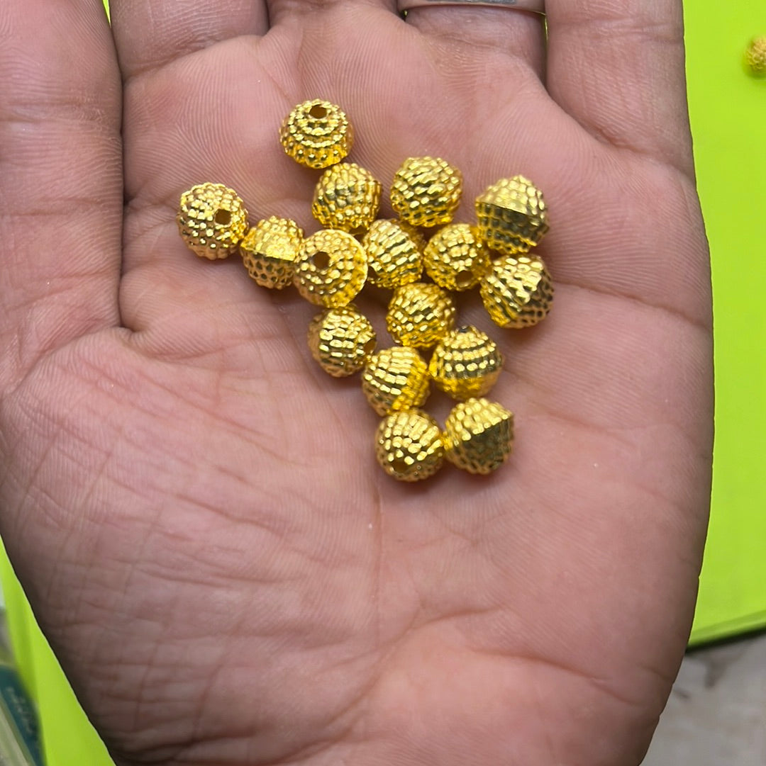 Golden color round ridged plastic beads more than 25pc