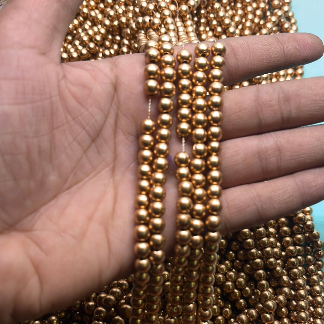 Gold  beads 6mm-500 beads in a punch