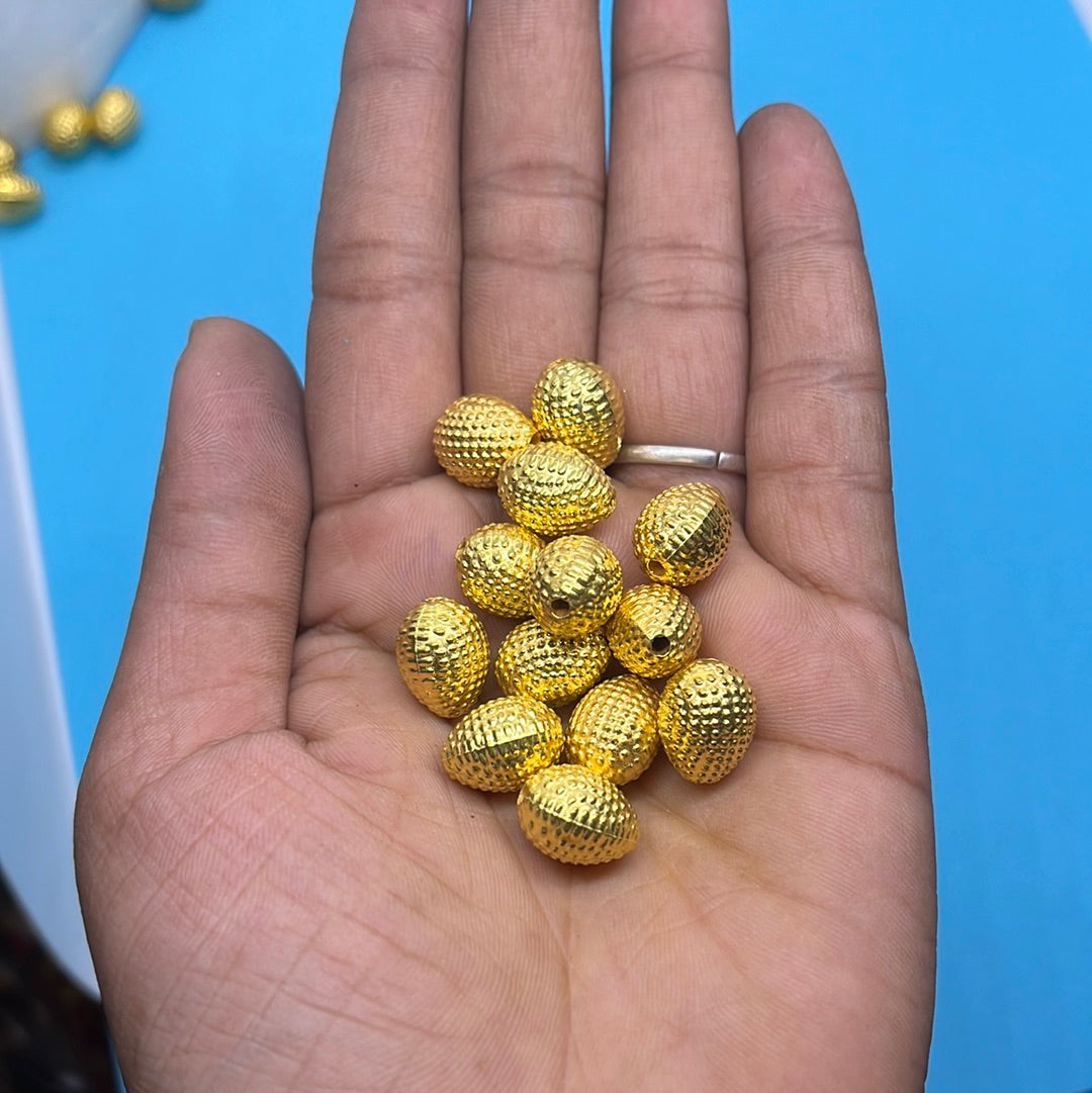 Sewn golden beads more than 25pc