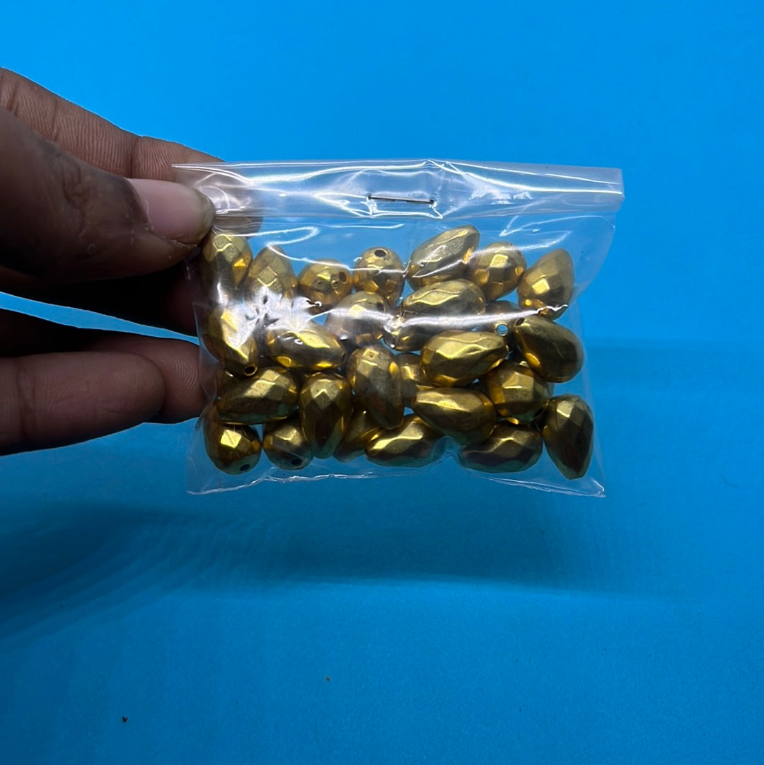 Drop shape beads gold color more than 25pc