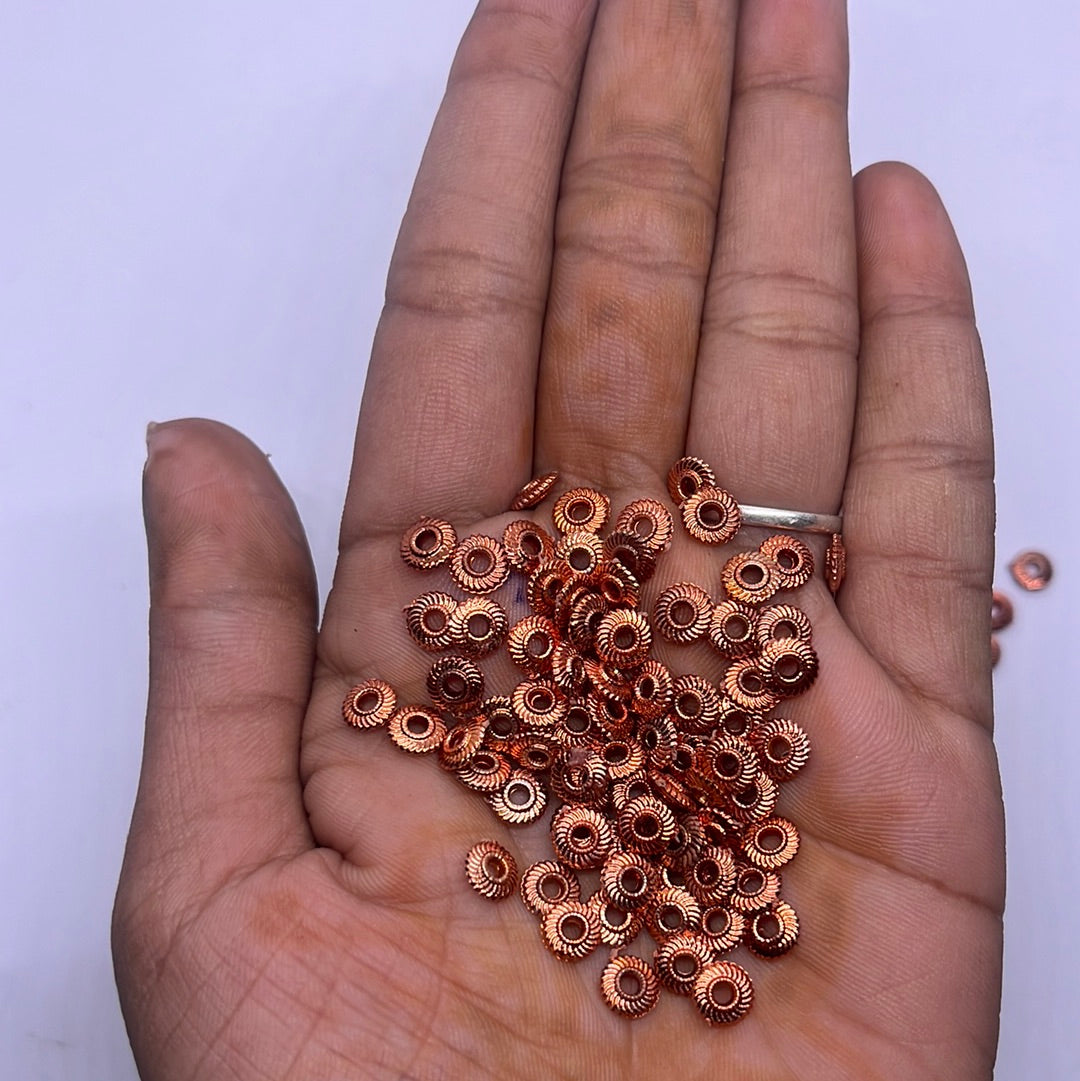 Bye rope Bali spacer  copper plated beads