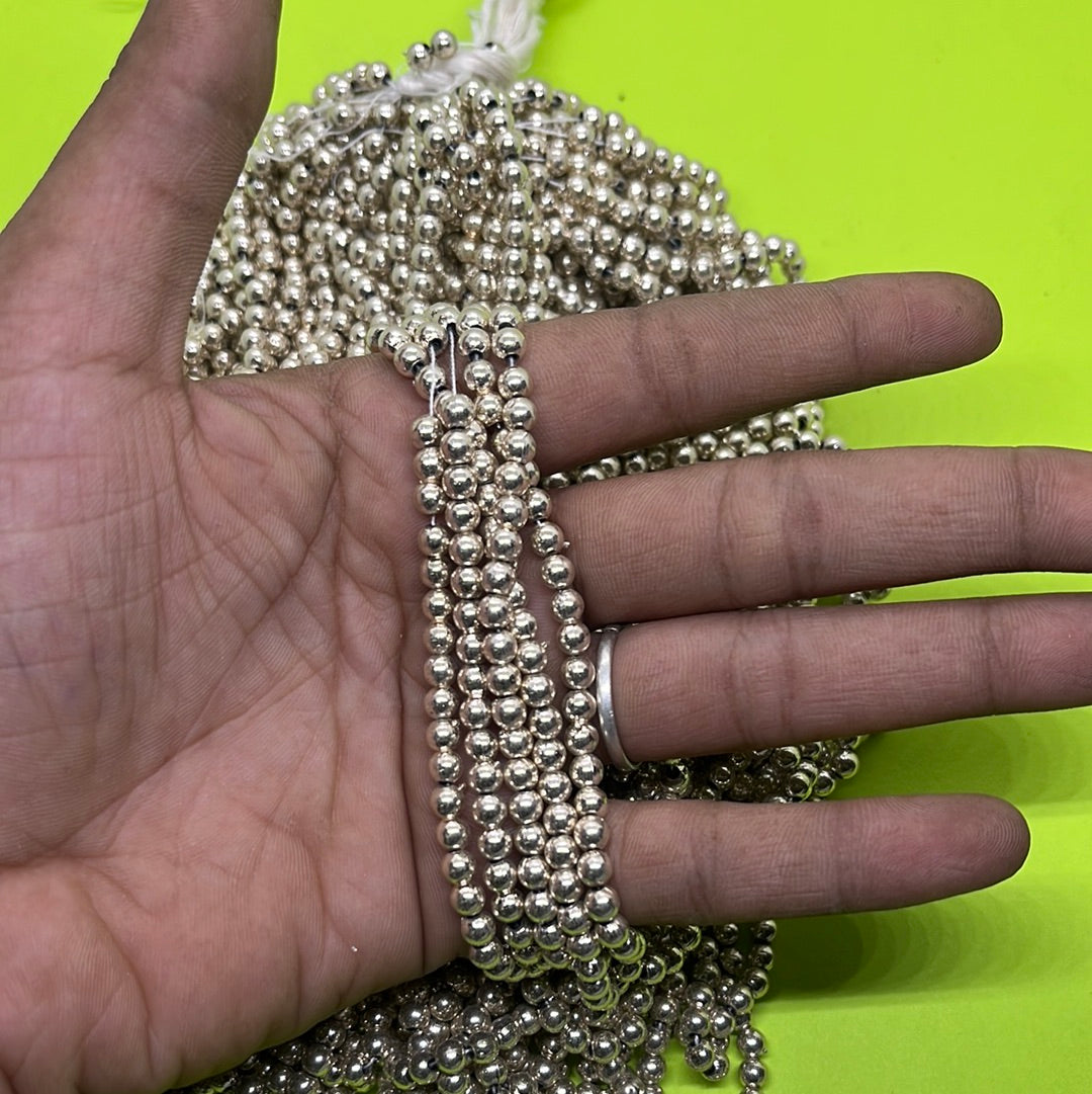 4mm silver  Beads 1 punch