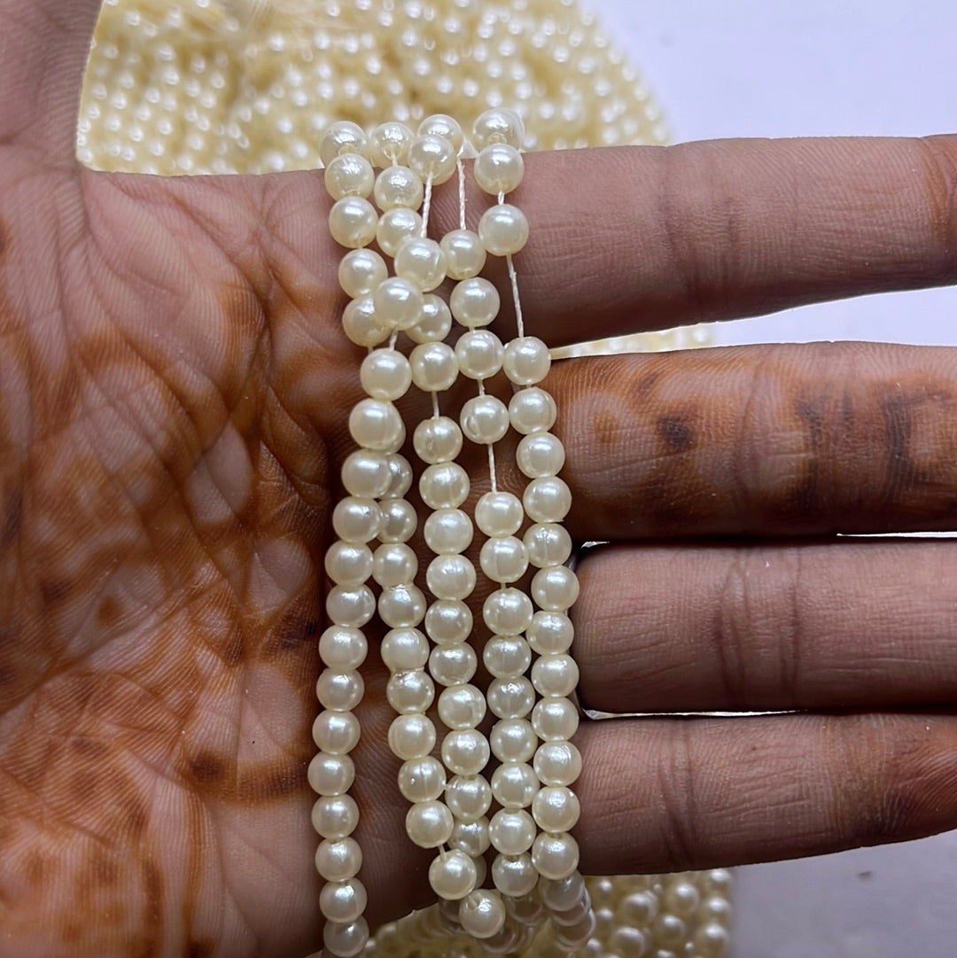 White round beads 4mm - 500 beads in a punch