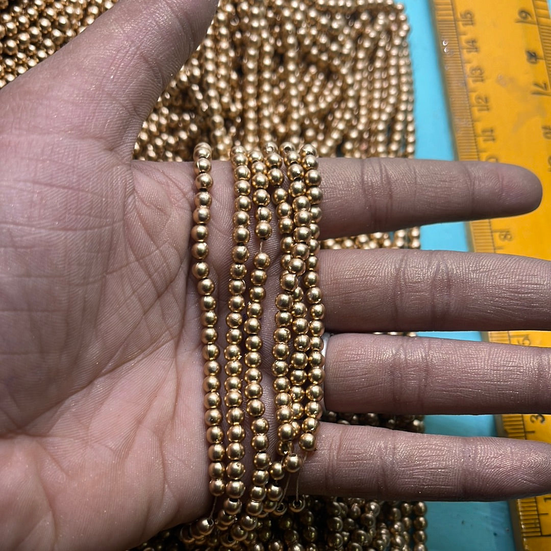 Gold  beads 4mm-500 beads in a punch
