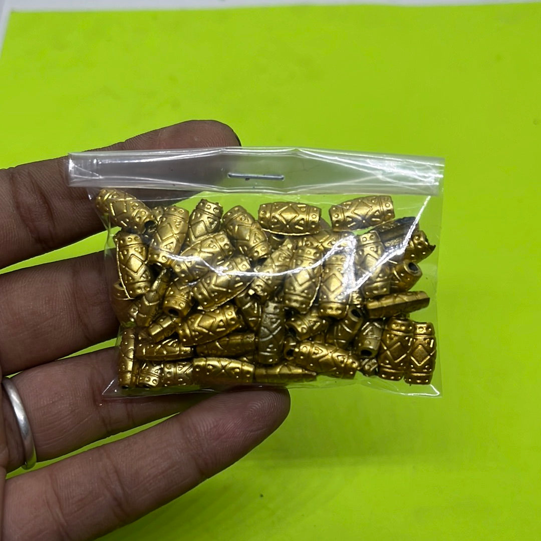 Golden colored plastic beads more than 25pc