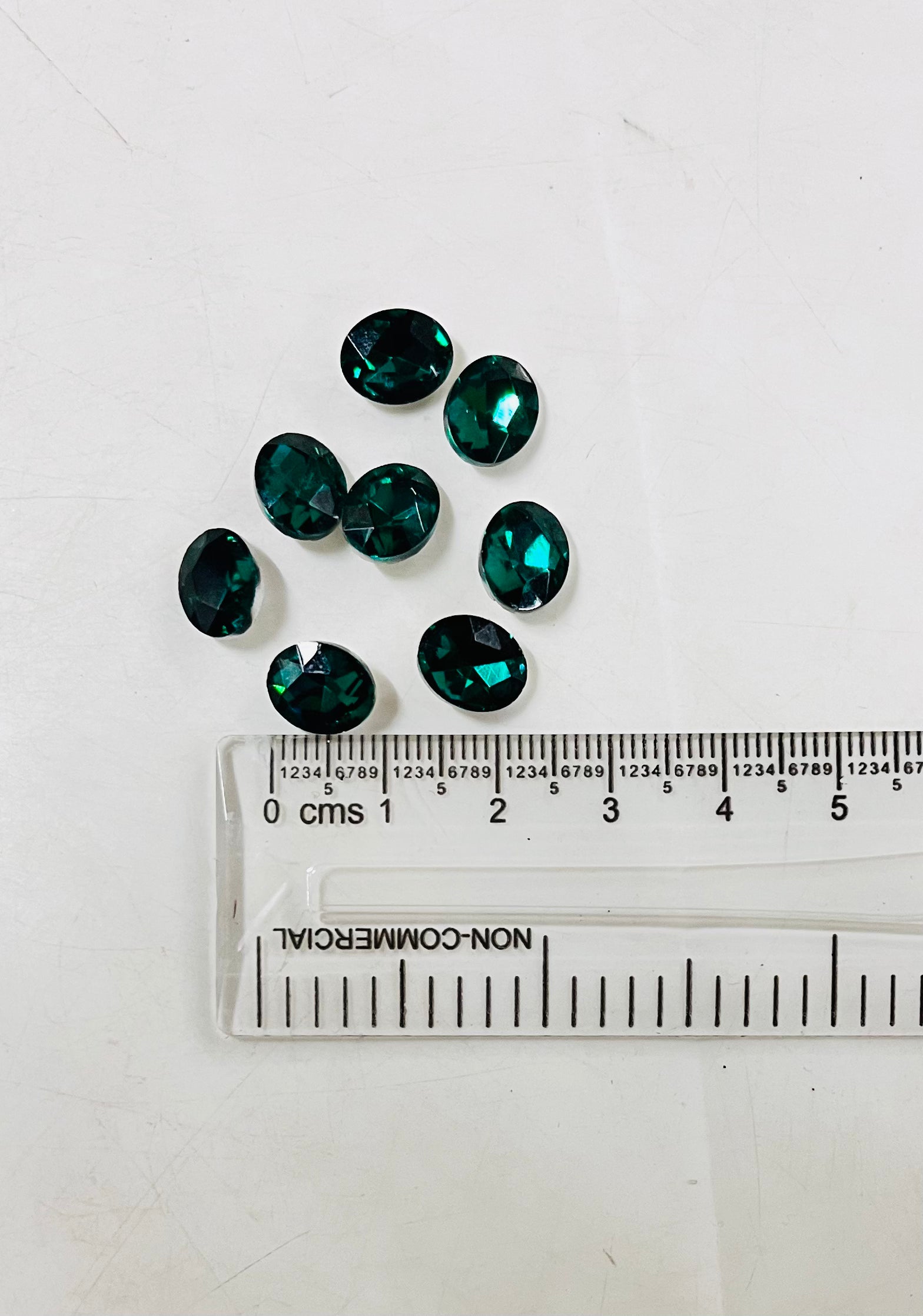 8x10 AD oval green  stone Tanjore Painting American diamond Kundan stones-8 stones in a pack