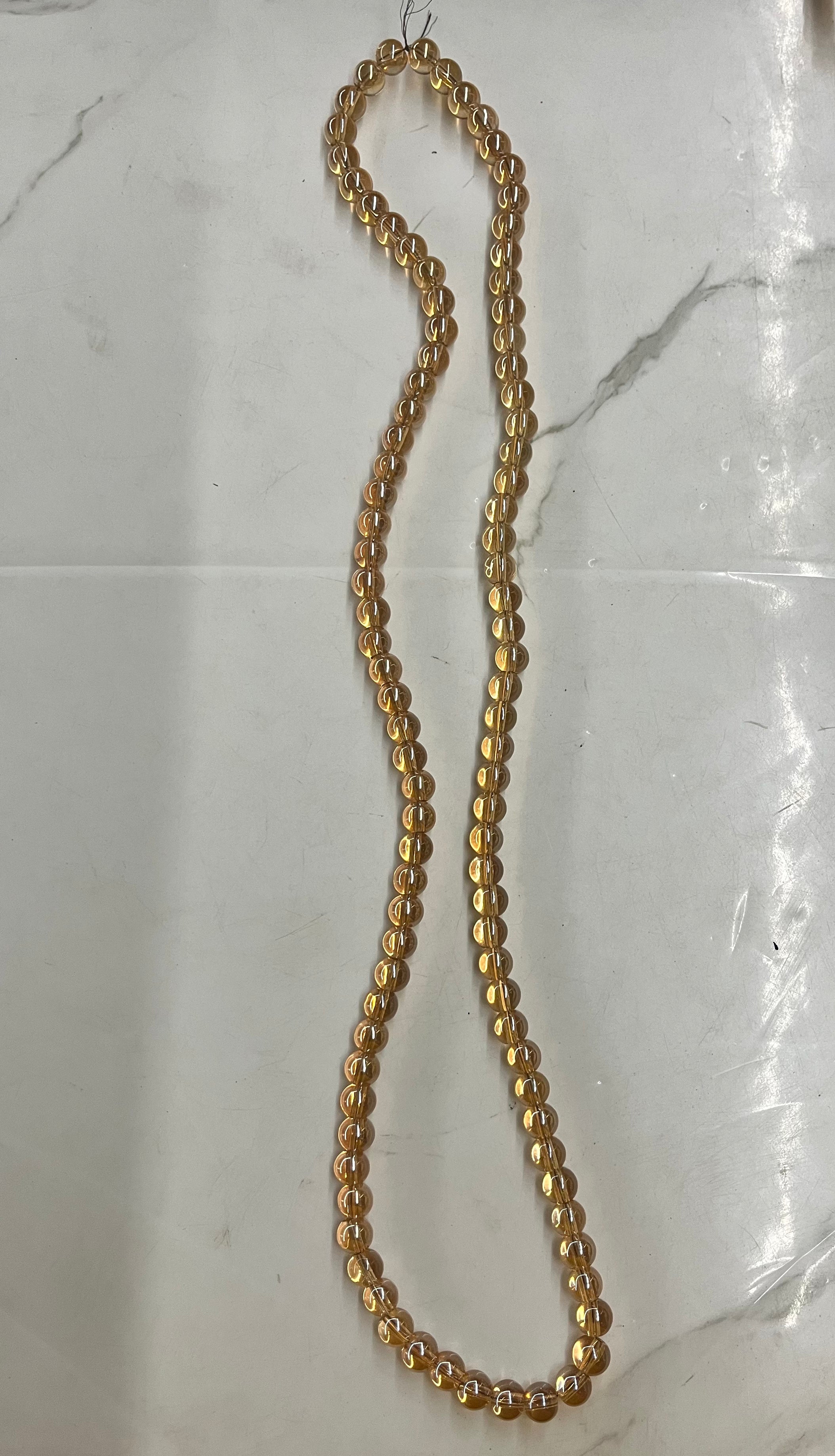 8mm golden Glass beads -one line -70 beads approx