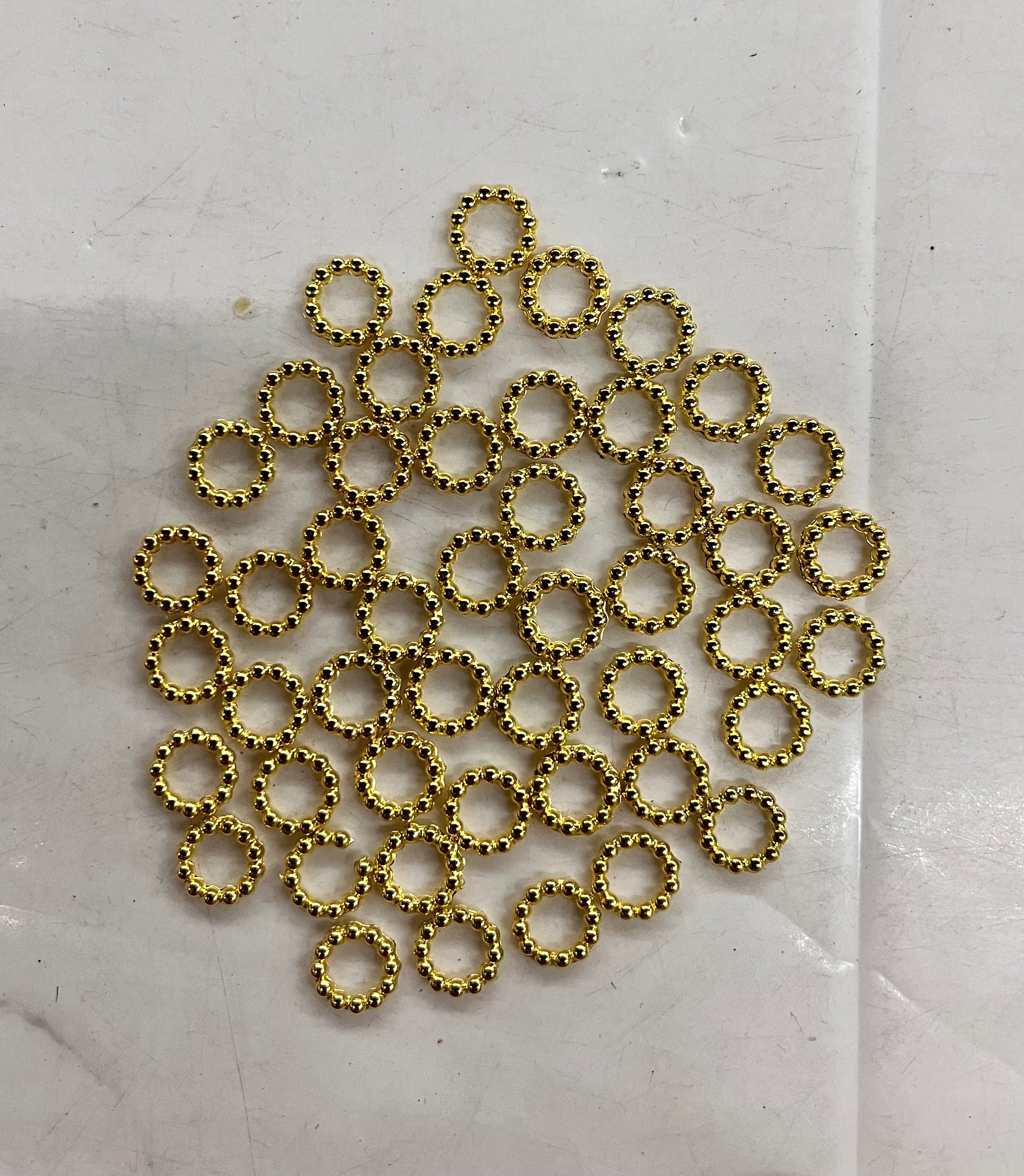 Gold plastic rings with stripes more than 25pcs -25g pack