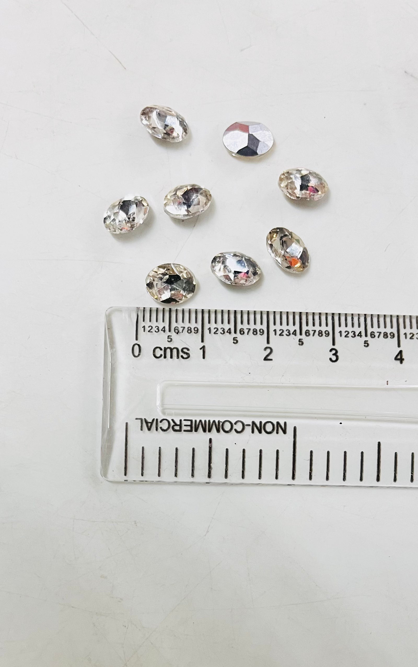 8x6 AD oval white stone Tanjore Painting American diamond Kundan stones-8 stones in a pack