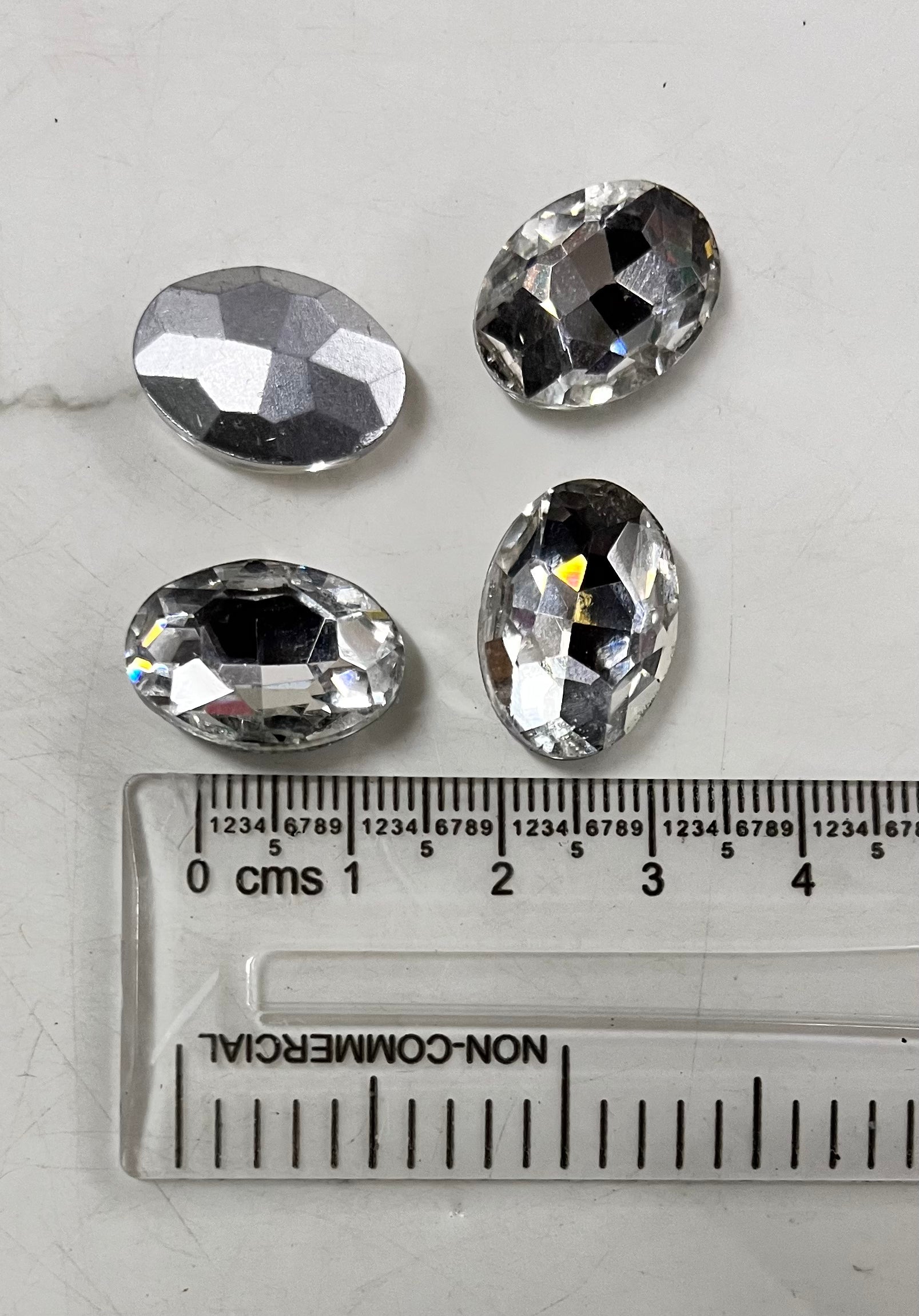 13x18 AD oval white stone Tanjore Painting American diamond Kundan stones-4 stones in a pack
