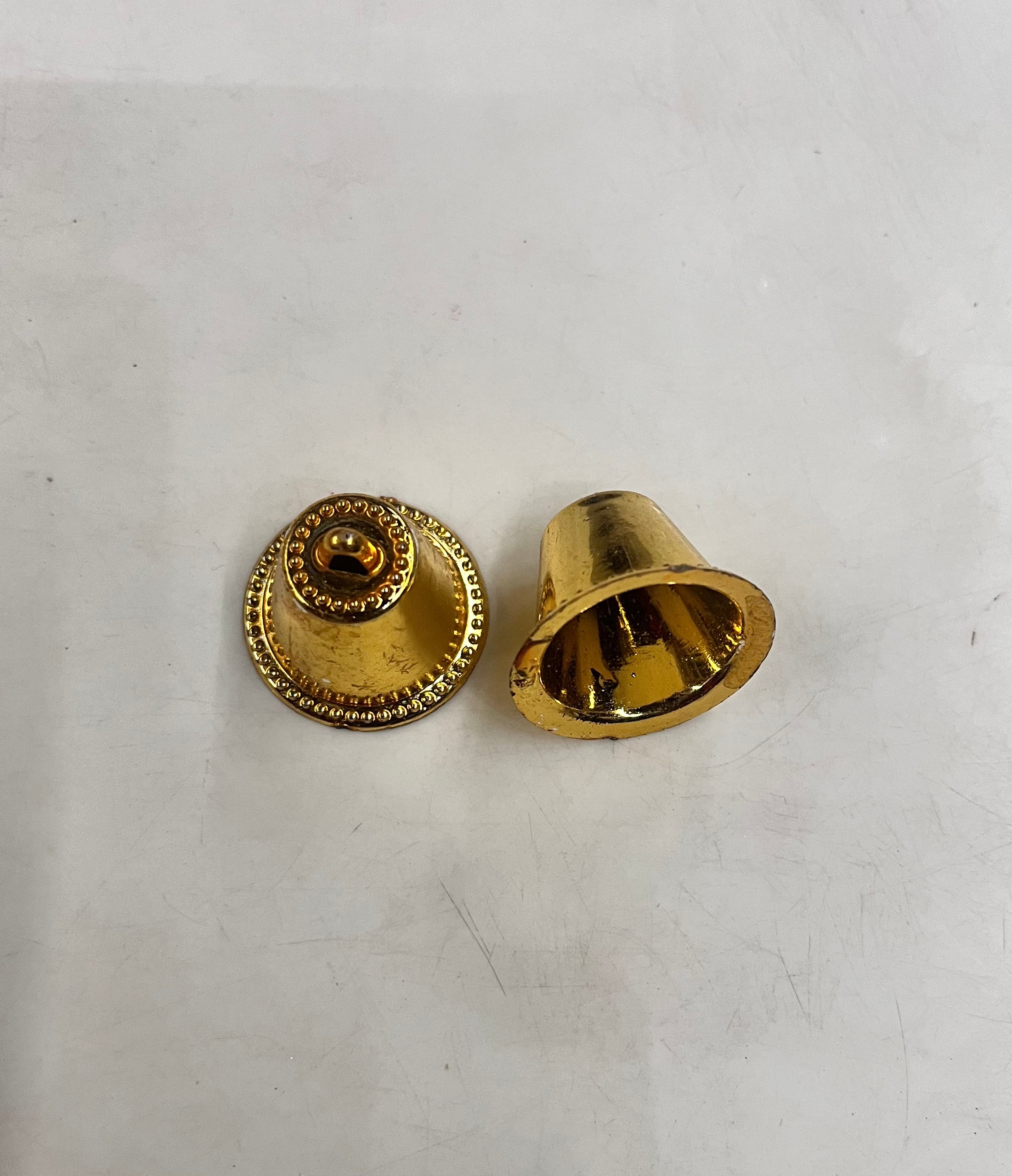 Plastic golden bells small size 50g pack- sbel