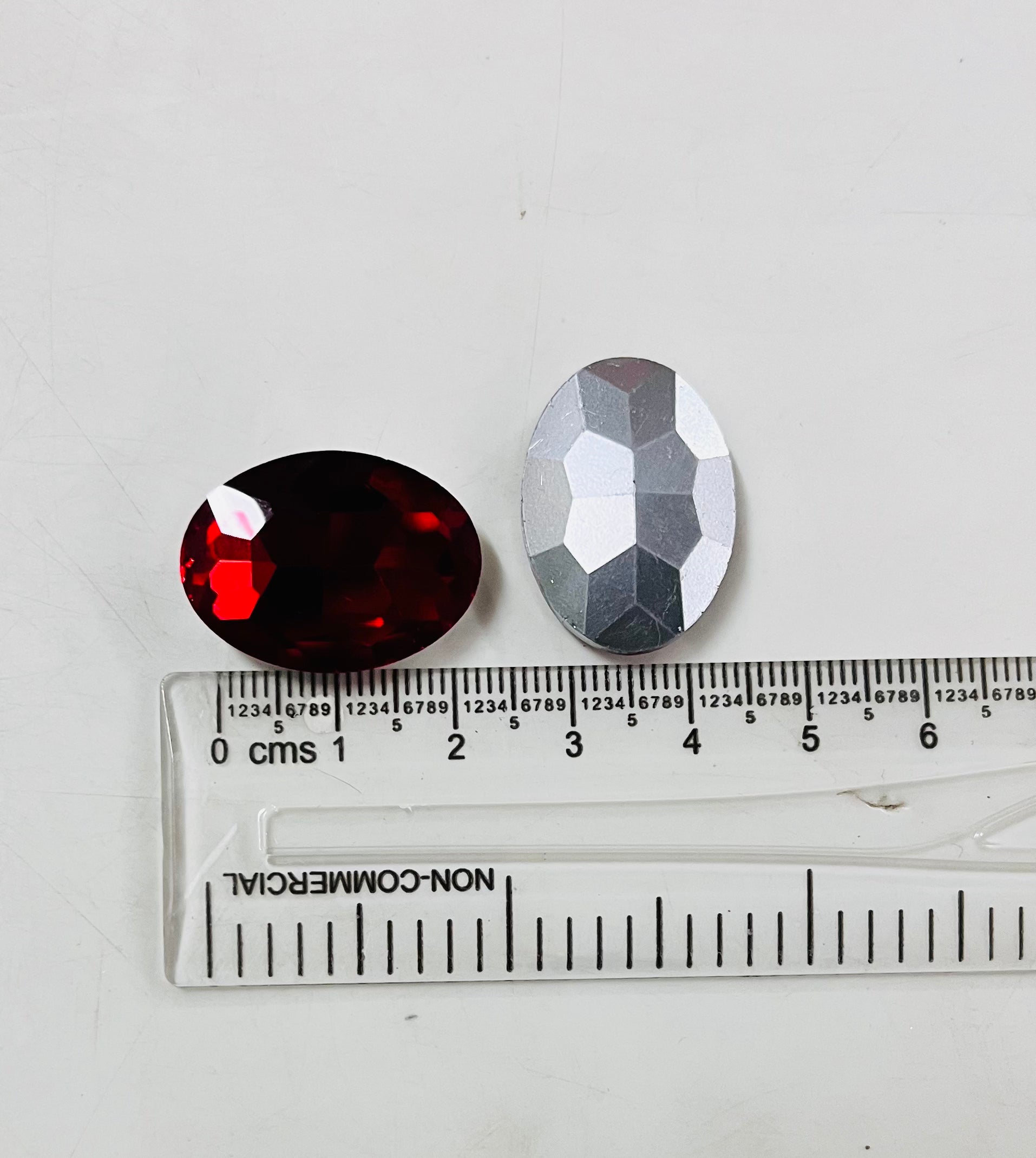 18x24 AD oval Red stone Tanjore Painting American diamond Kundan stones-2 stones in a pack