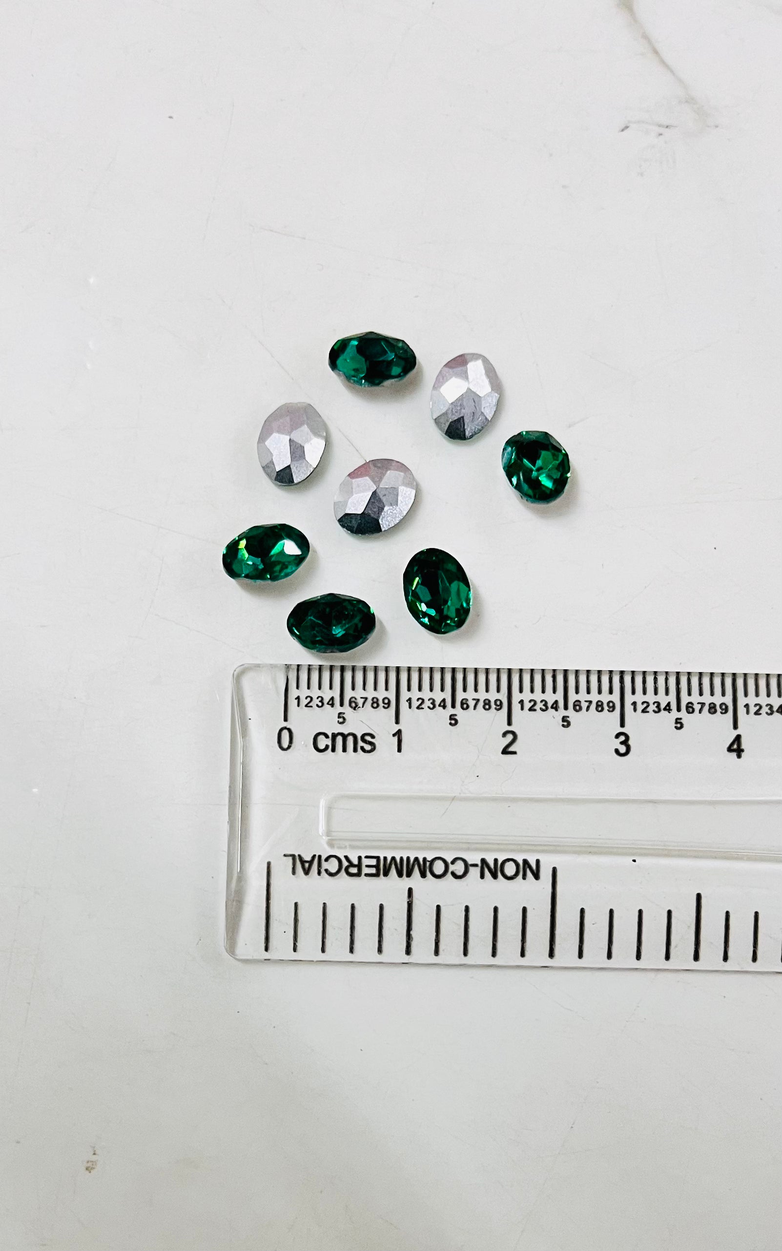 8x6 AD oval green  stone Tanjore Painting American diamond Kundan stones-8 stones in a pack