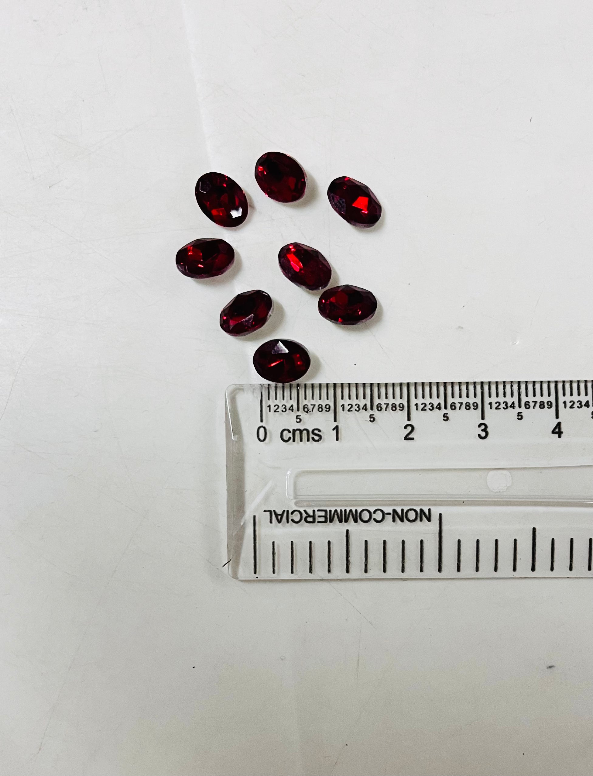 8x6 AD oval red  stone Tanjore Painting American diamond Kundan stones-8 stones in a pack