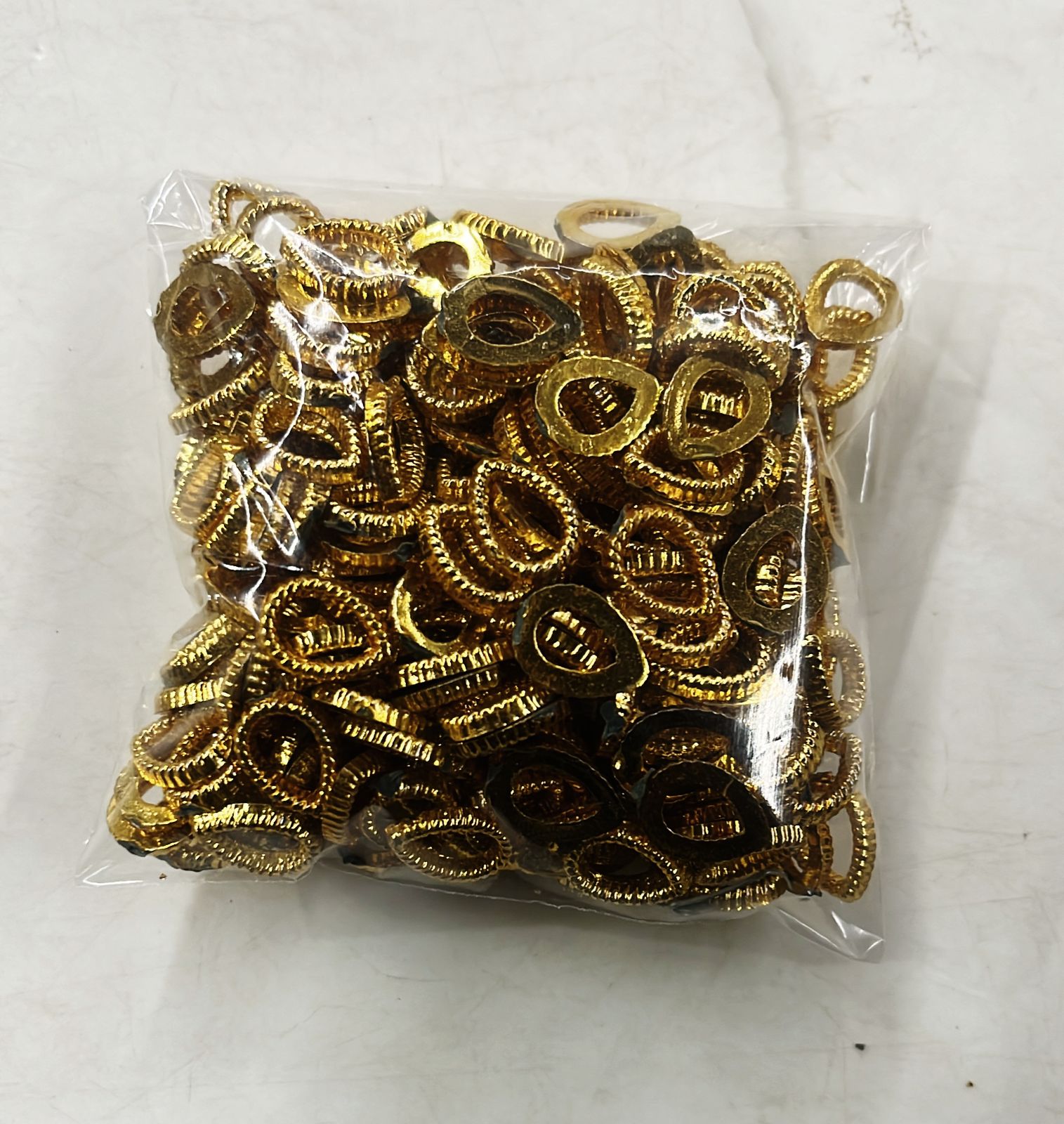 Golden Acrylic frame for kundan stone -25g pack assorted designs approximate 50pieces