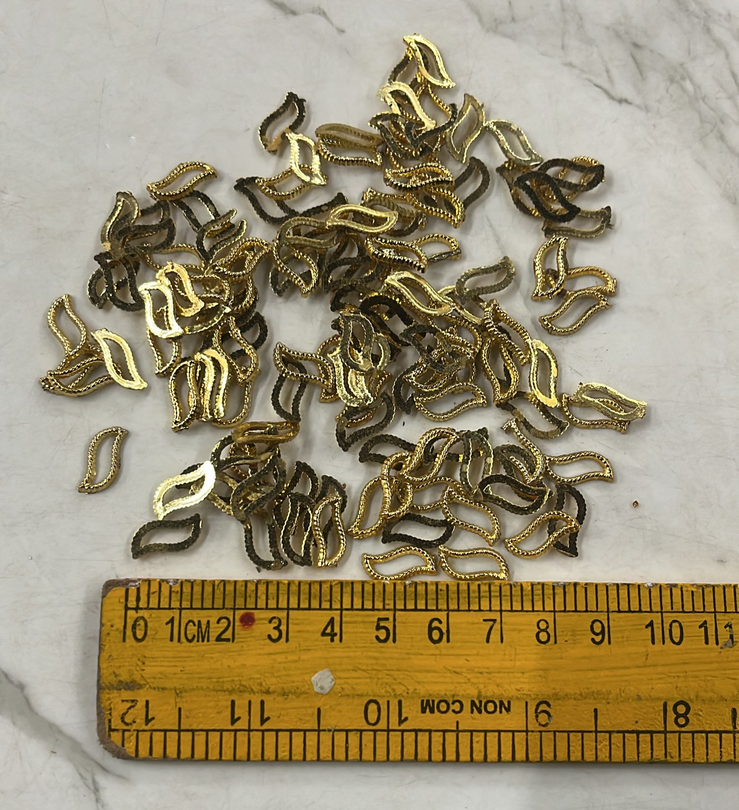 Golden Acrylic frame for kundan stone -25g pack assorted designs approximate 50pieces