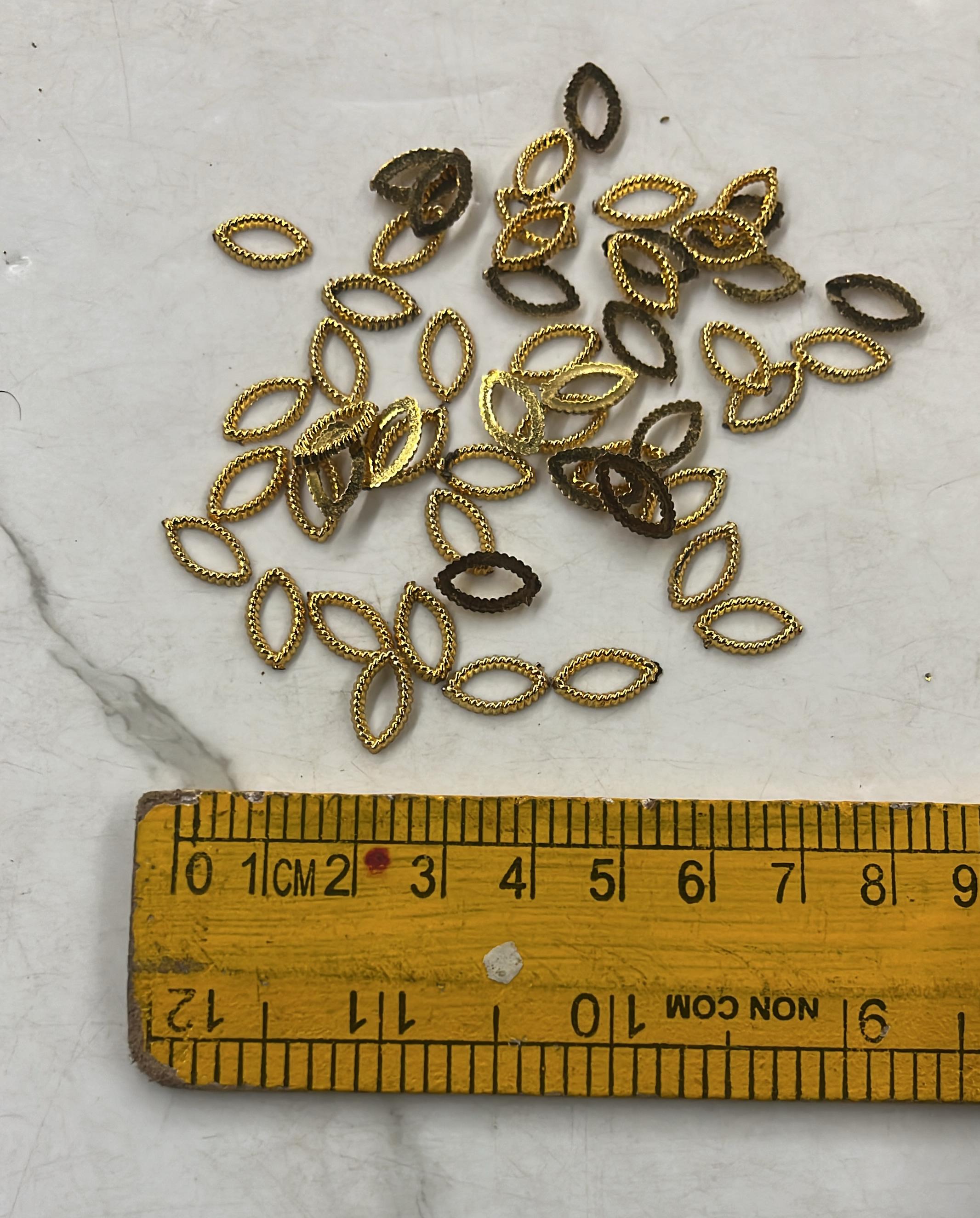 Golden Acrylic frame for kundan stone -25g pack assorted designs approximate 50pieces