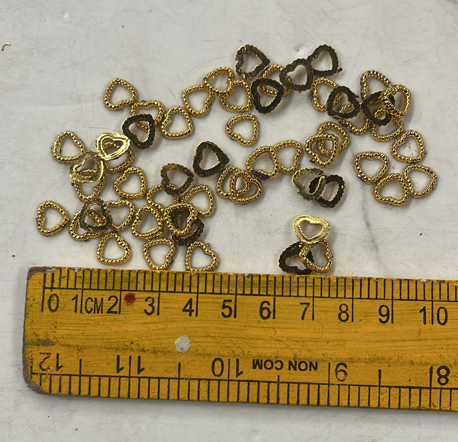 Golden Acrylic frame for kundan stone -25g pack assorted designs approximate 50pieces