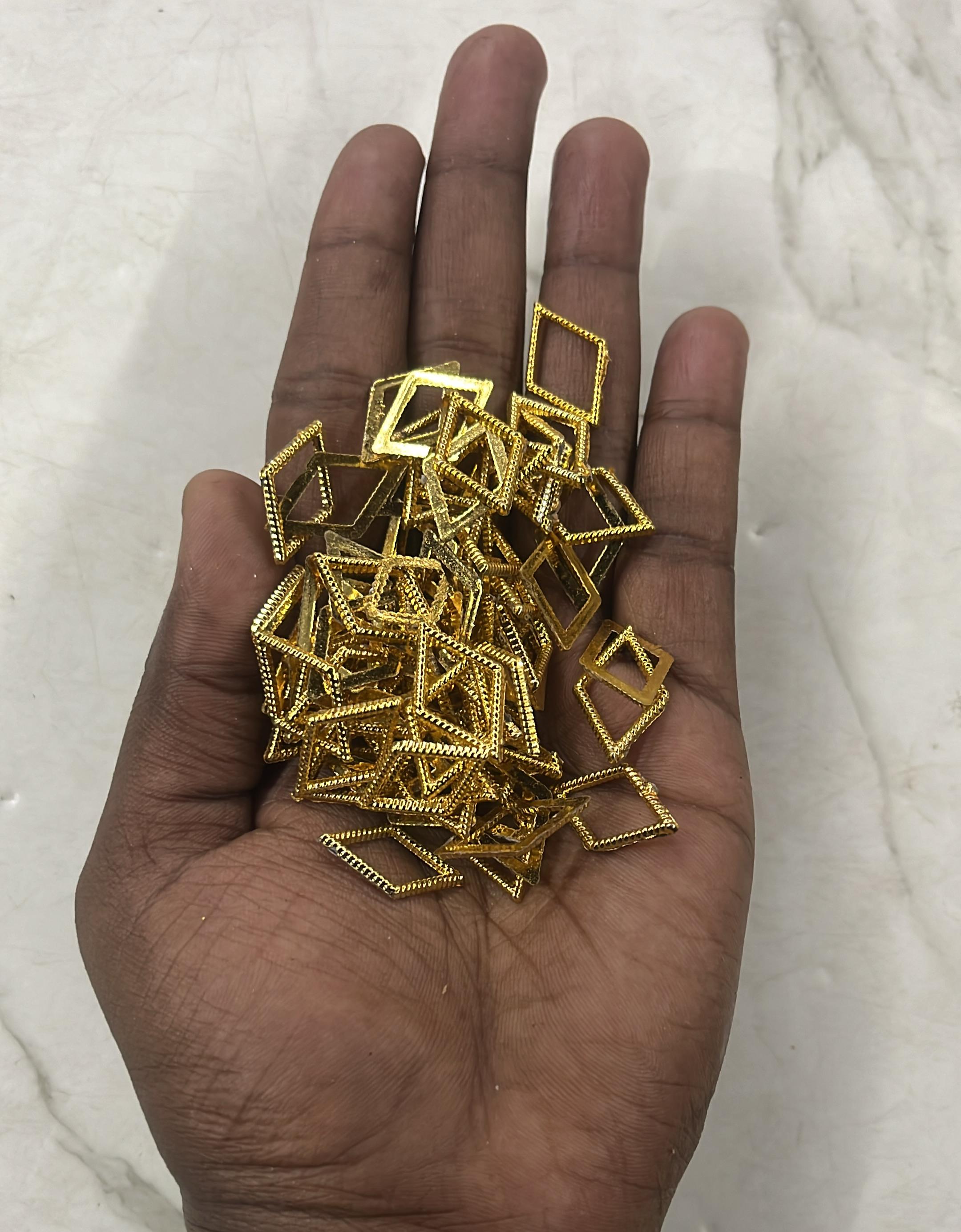 Golden Acrylic frame for kundan stone -25g pack assorted designs approximate 50pieces