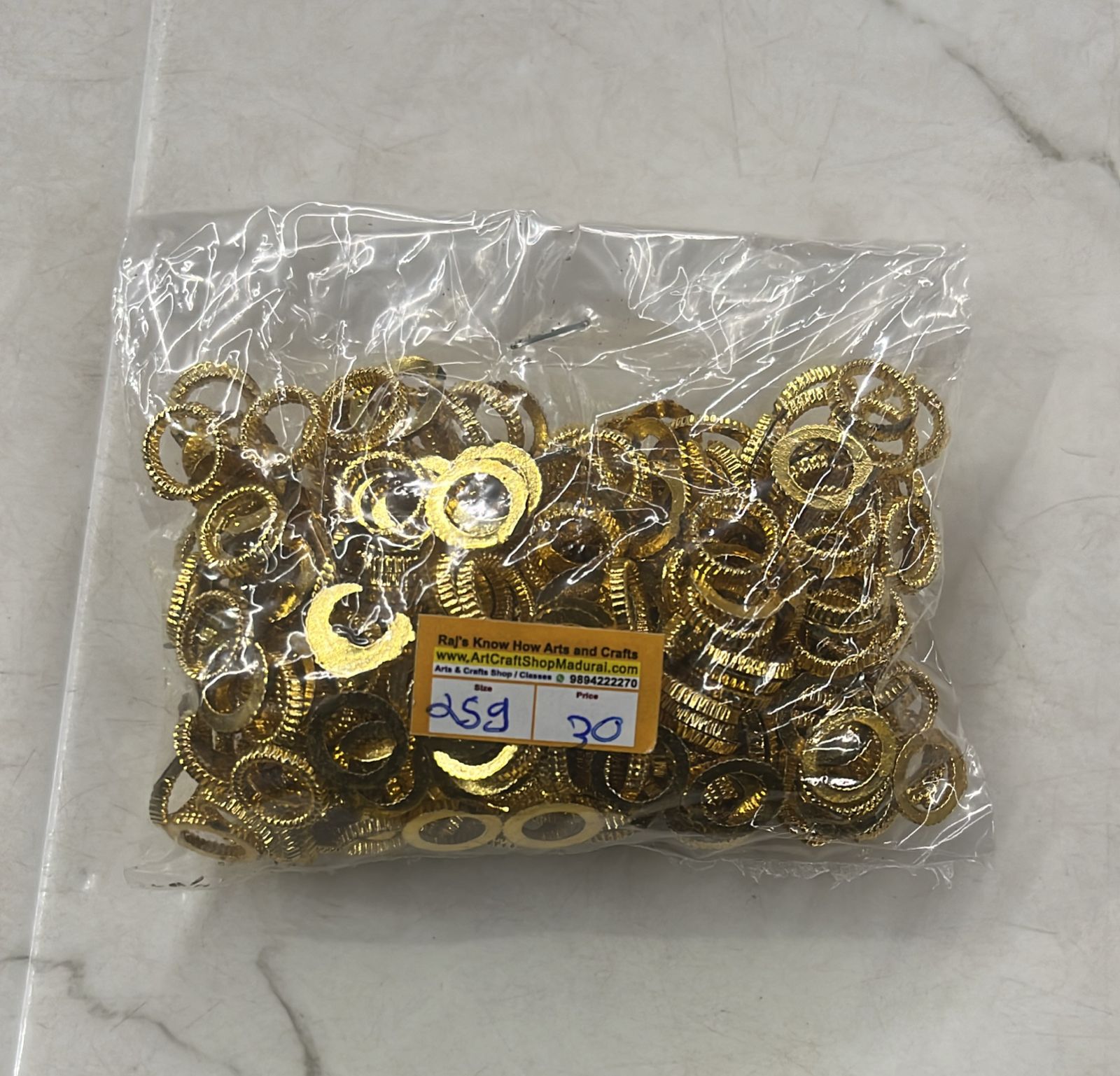 Golden Acrylic frame for kundan stone -25g pack assorted designs approximate 50pieces