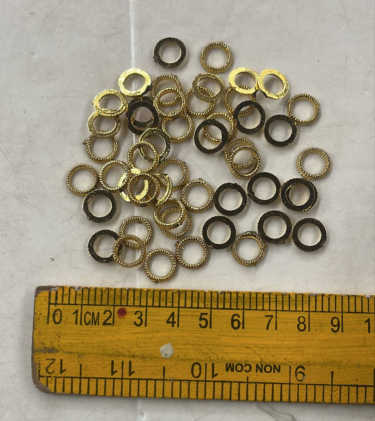 Golden Acrylic frame for kundan stone -25g pack assorted designs approximate 50pieces