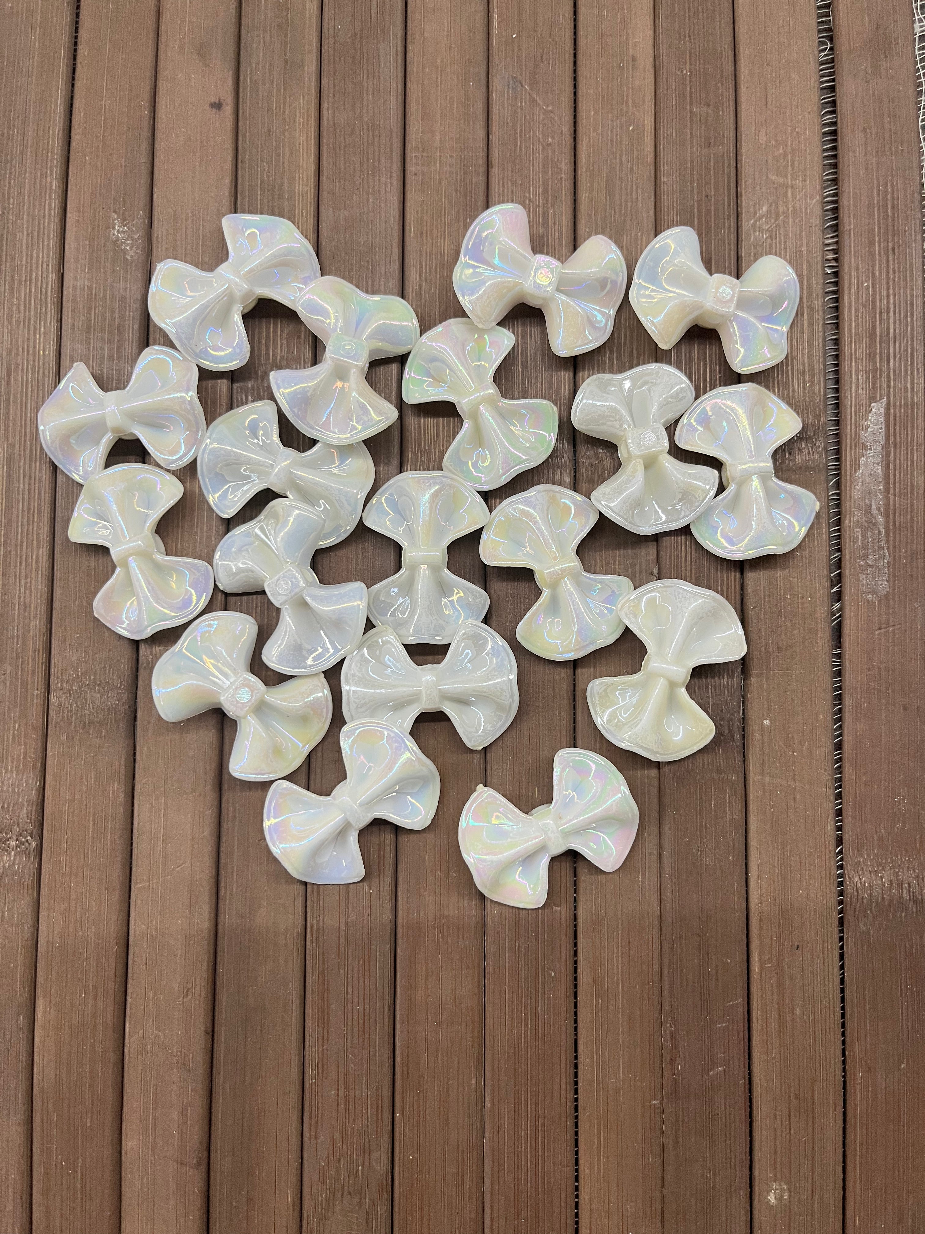 Pearl white bow beads 1inch- 50g