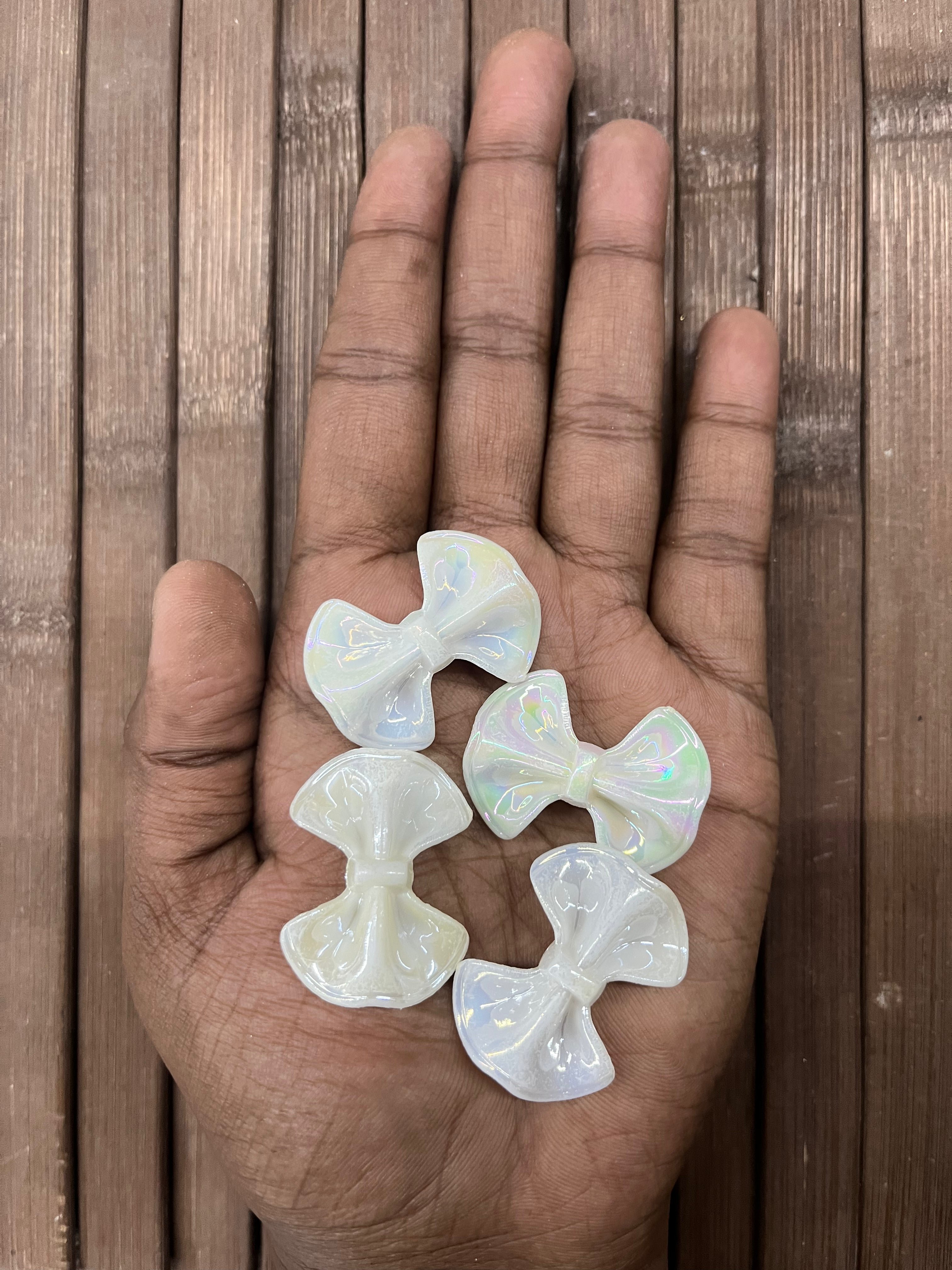 Pearl white bow beads 1inch- 50g