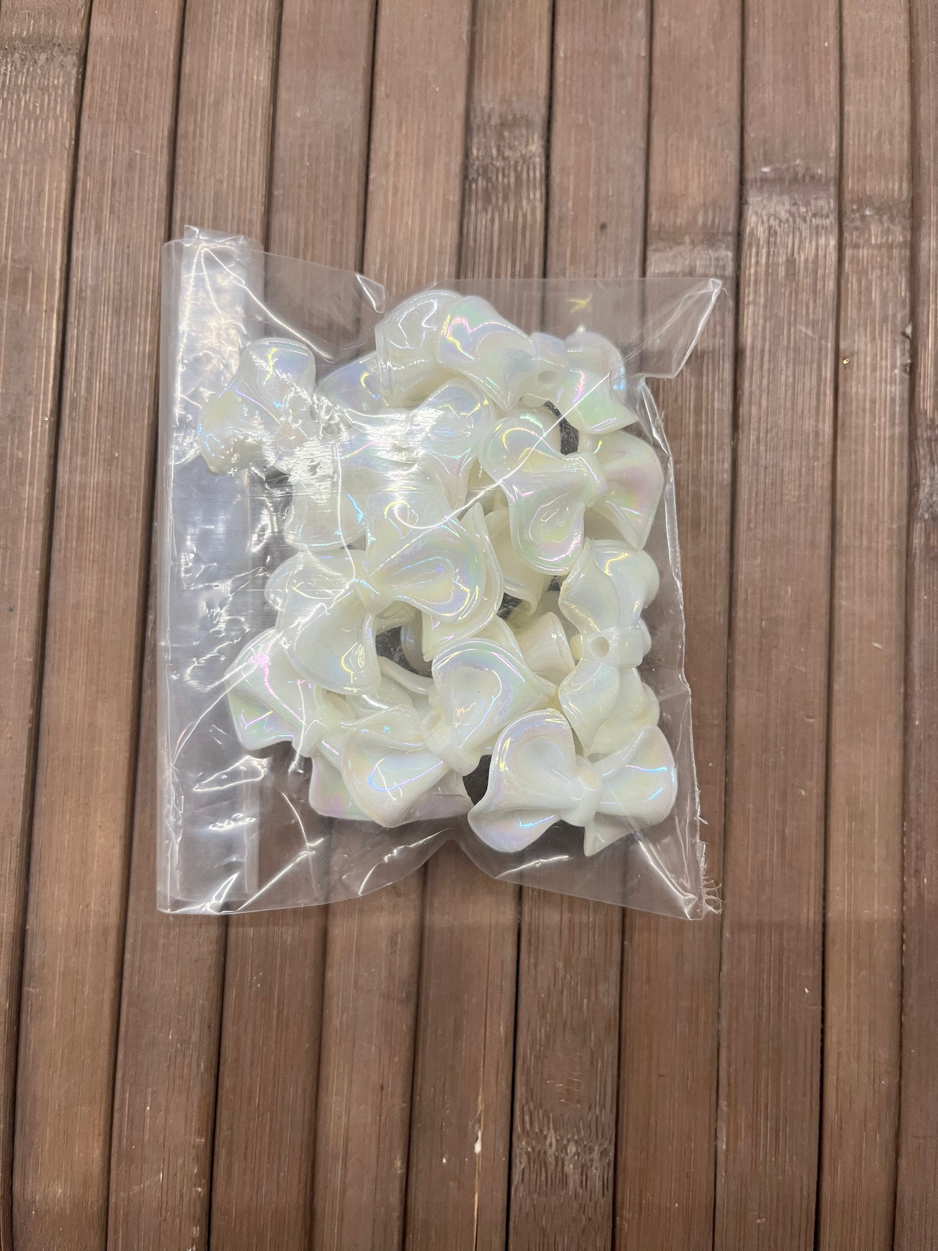 Pearl white bow beads 1inch- 50g