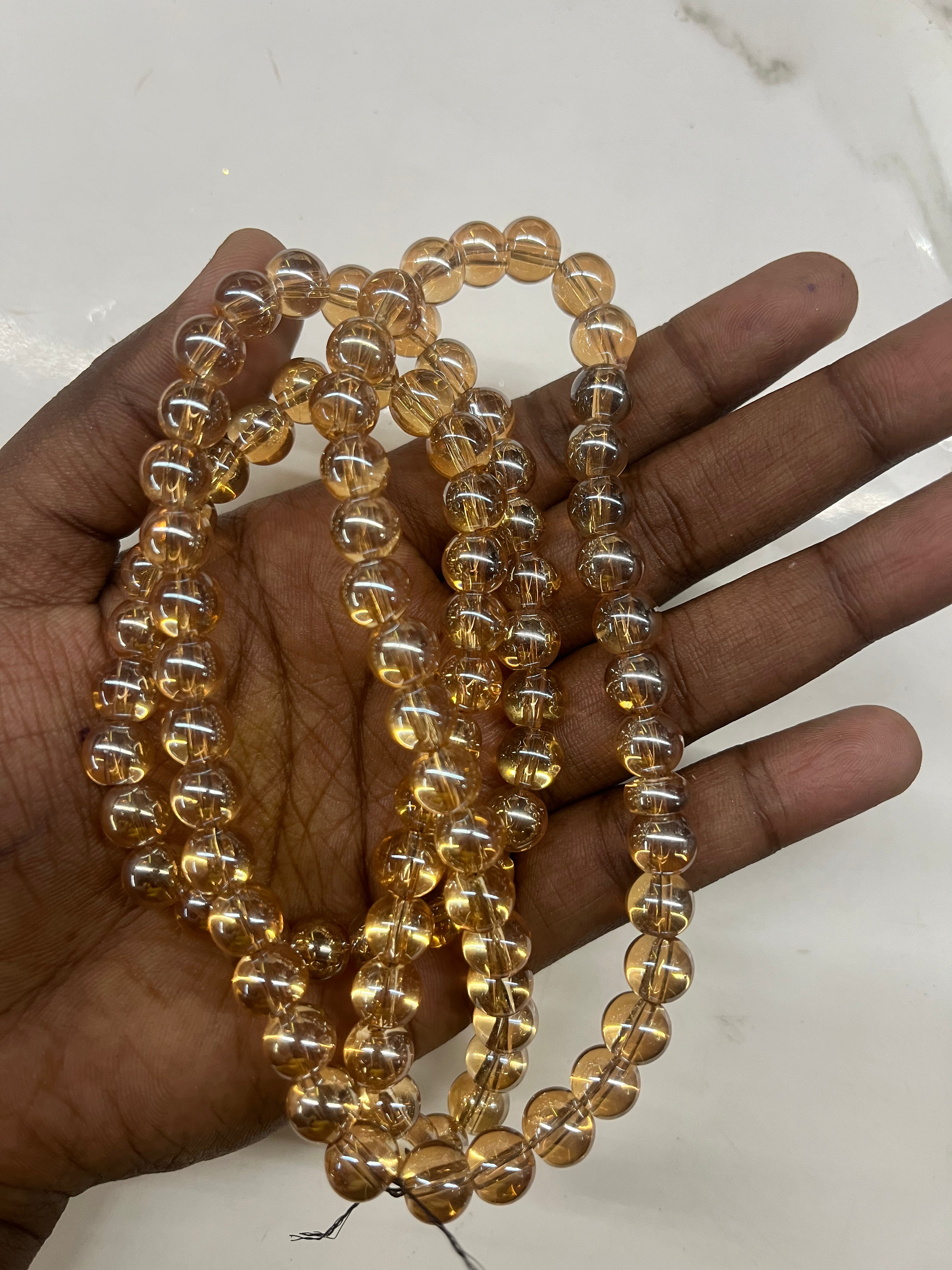 8mm golden Glass beads -one line -70 beads approx