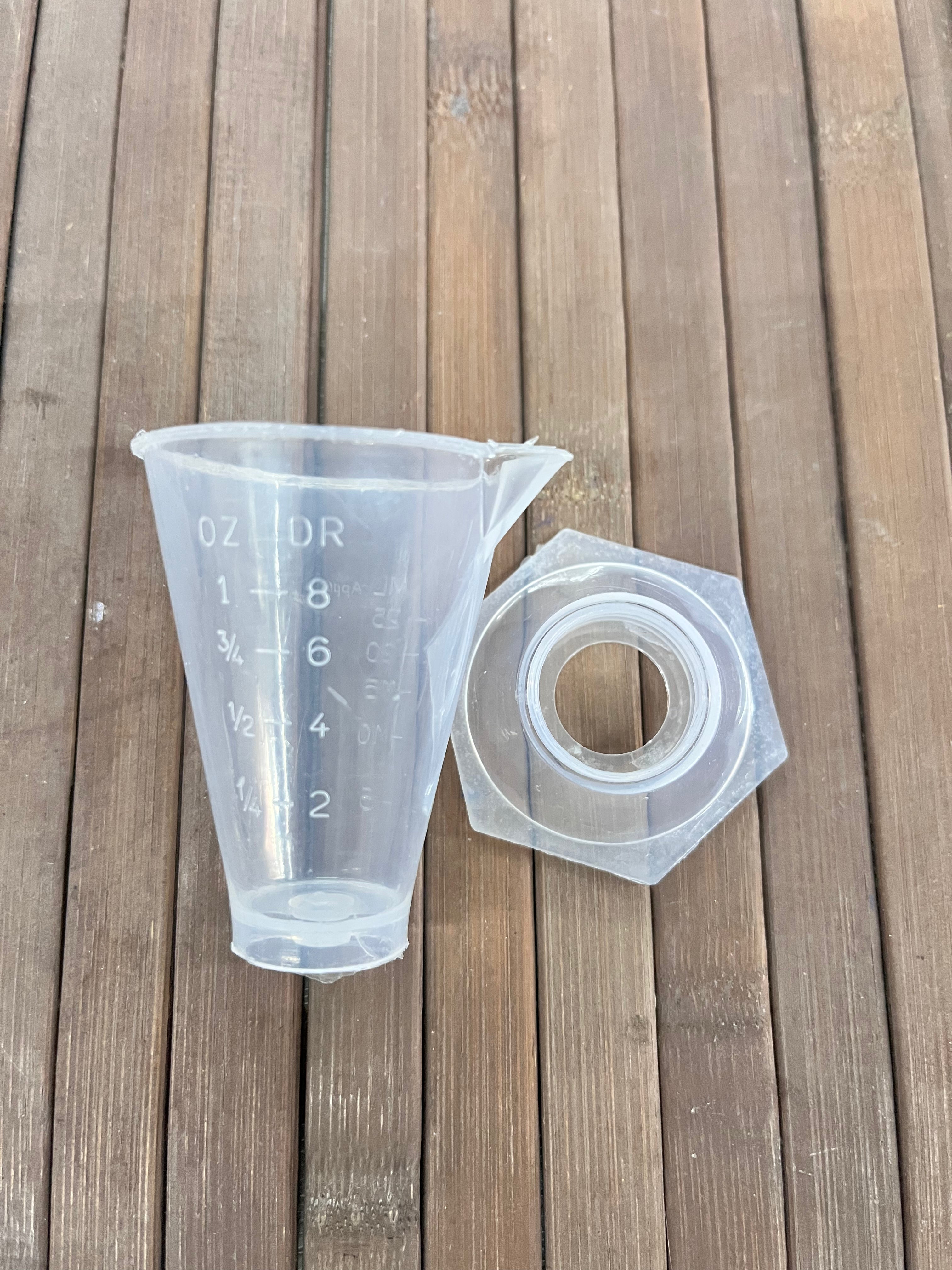 Measuring cup 25ml-ogl25