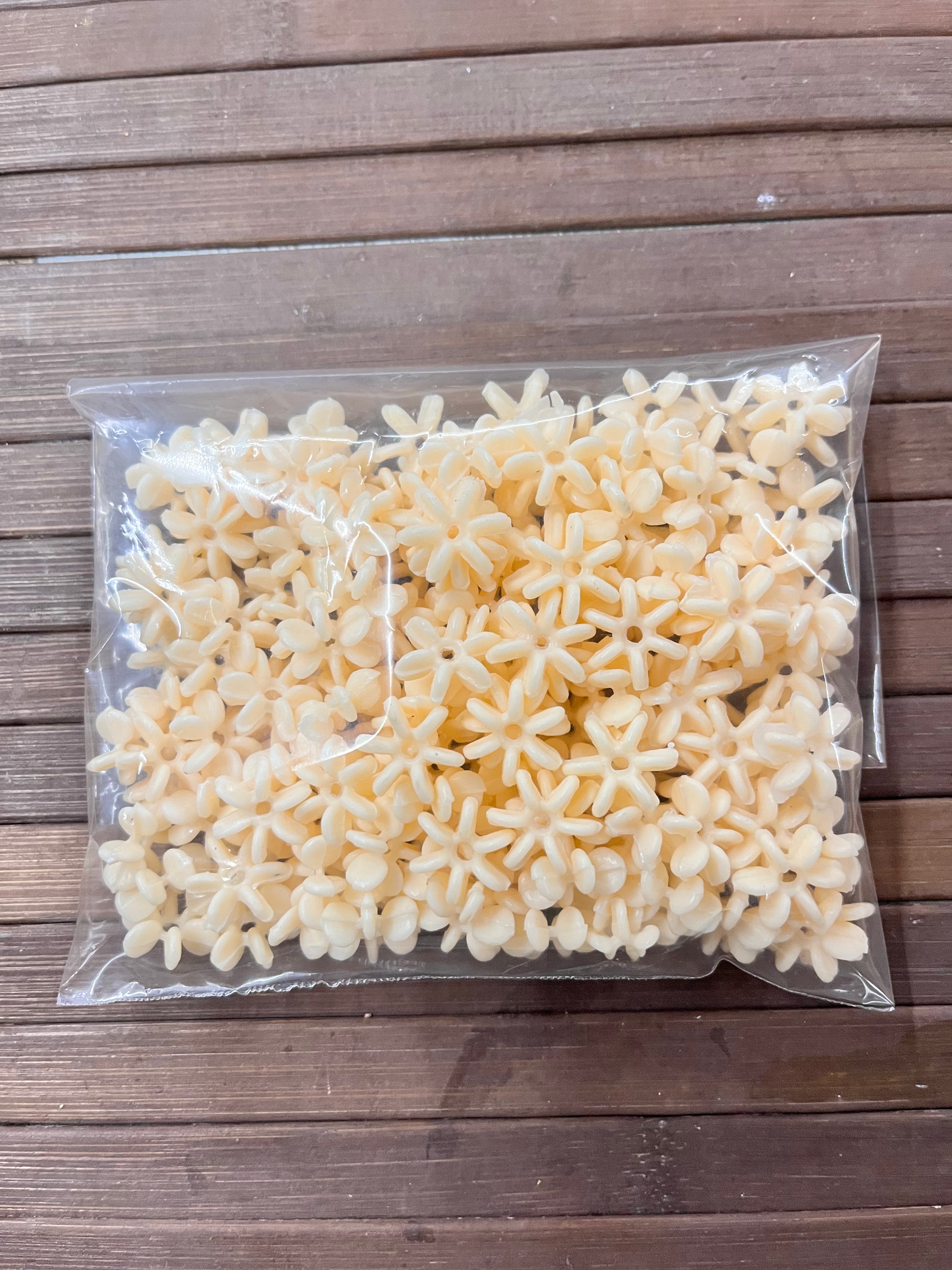 Acrylic plastic chakri ganga bead medium-100g in a pack