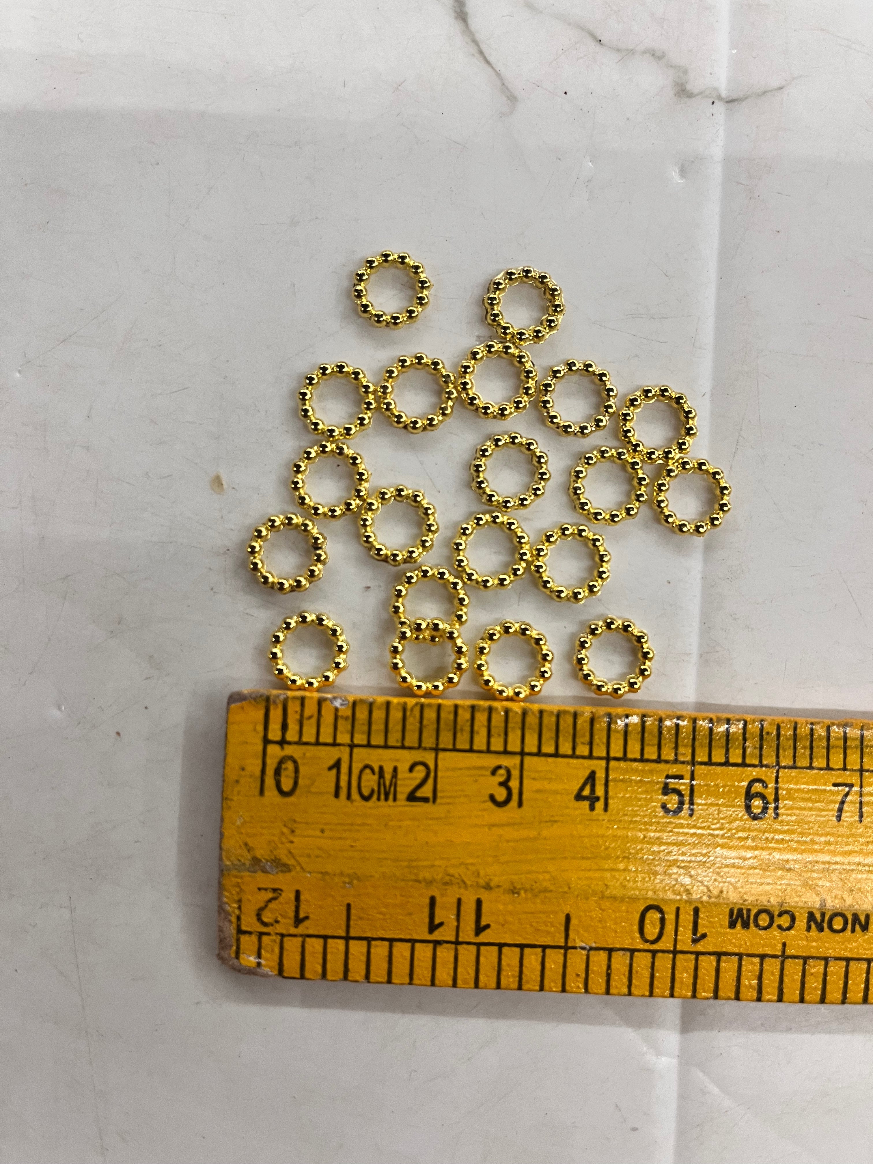 Gold plastic rings with stripes more than 25pcs -25g pack