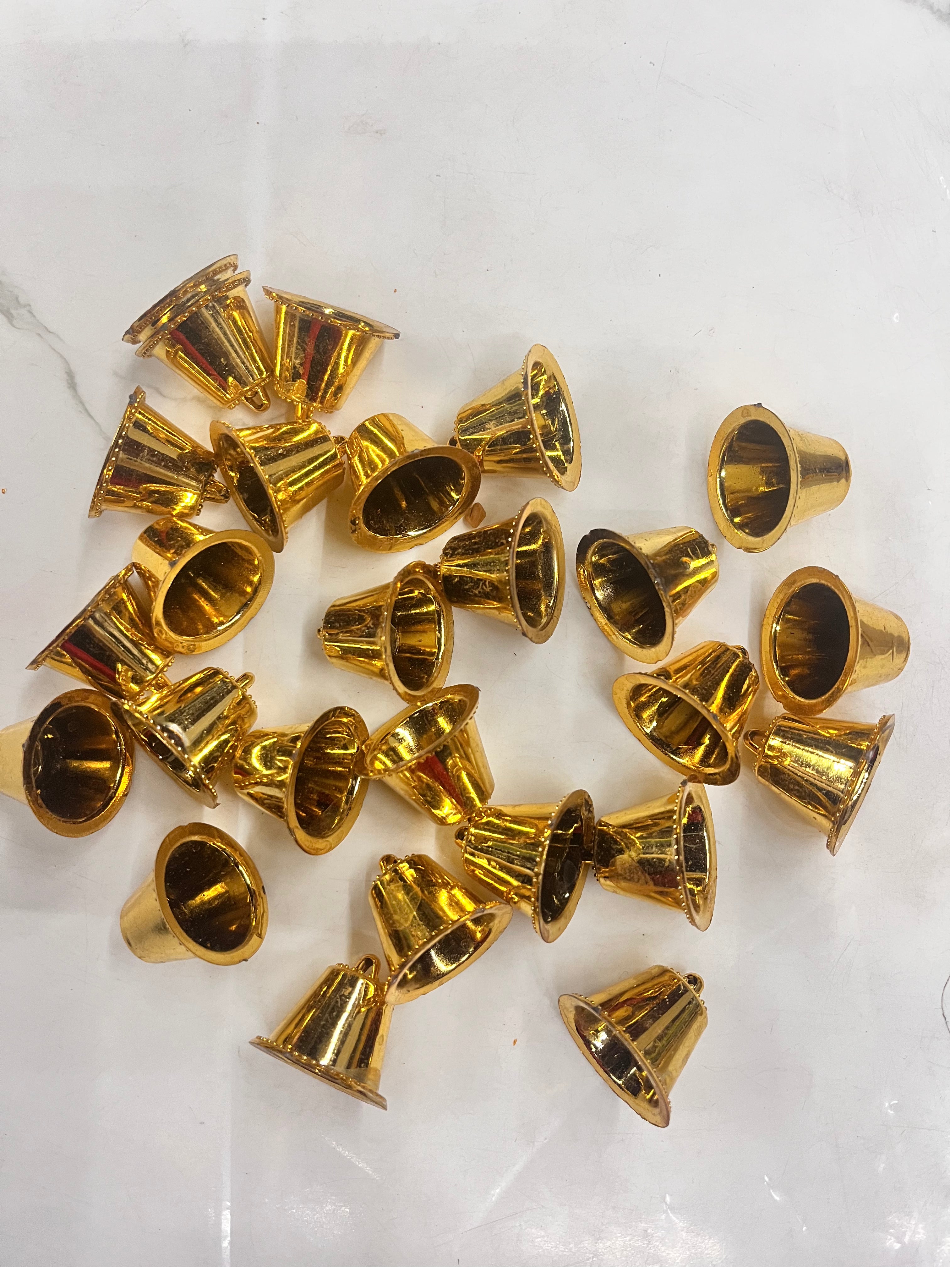 Plastic golden bells small size 50g pack- sbel