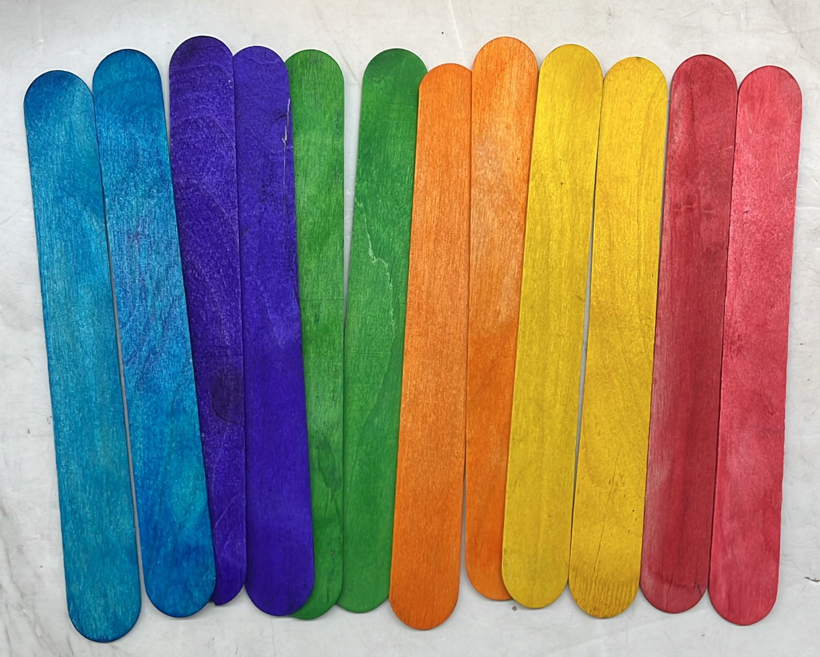 Colour and wooden popsicles