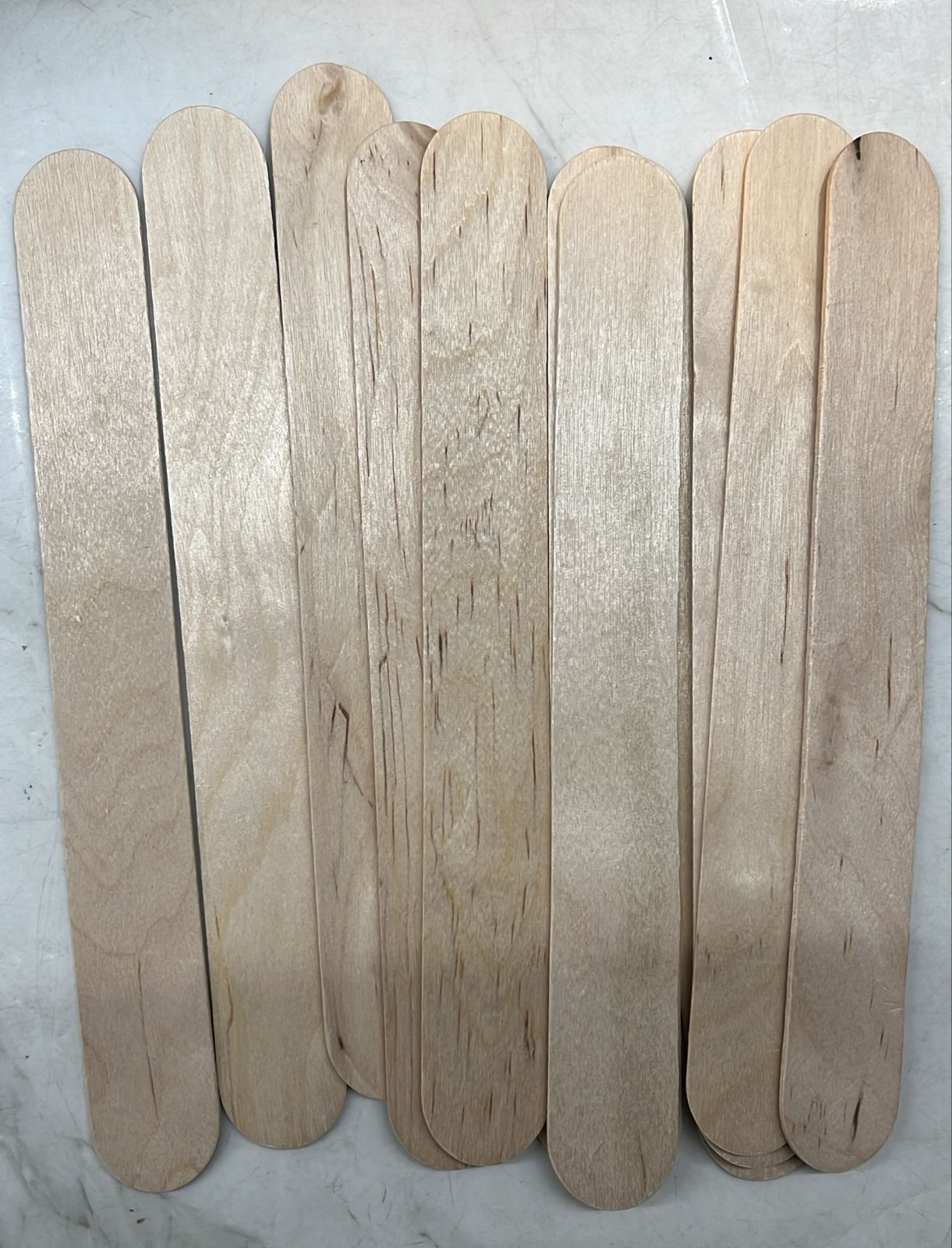 Colour and wooden popsicles