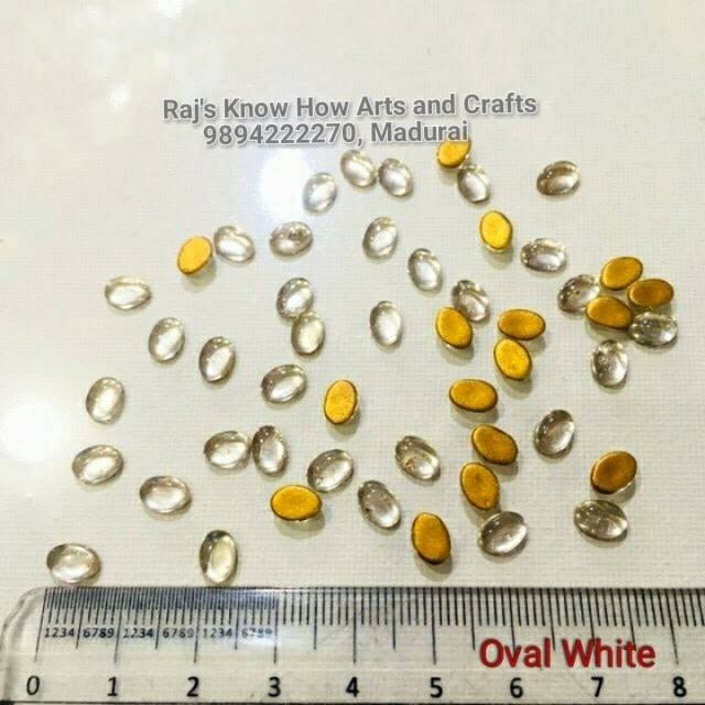Oval White Tanjore Painting Jaipur Kundan stones-50 stones in a pack